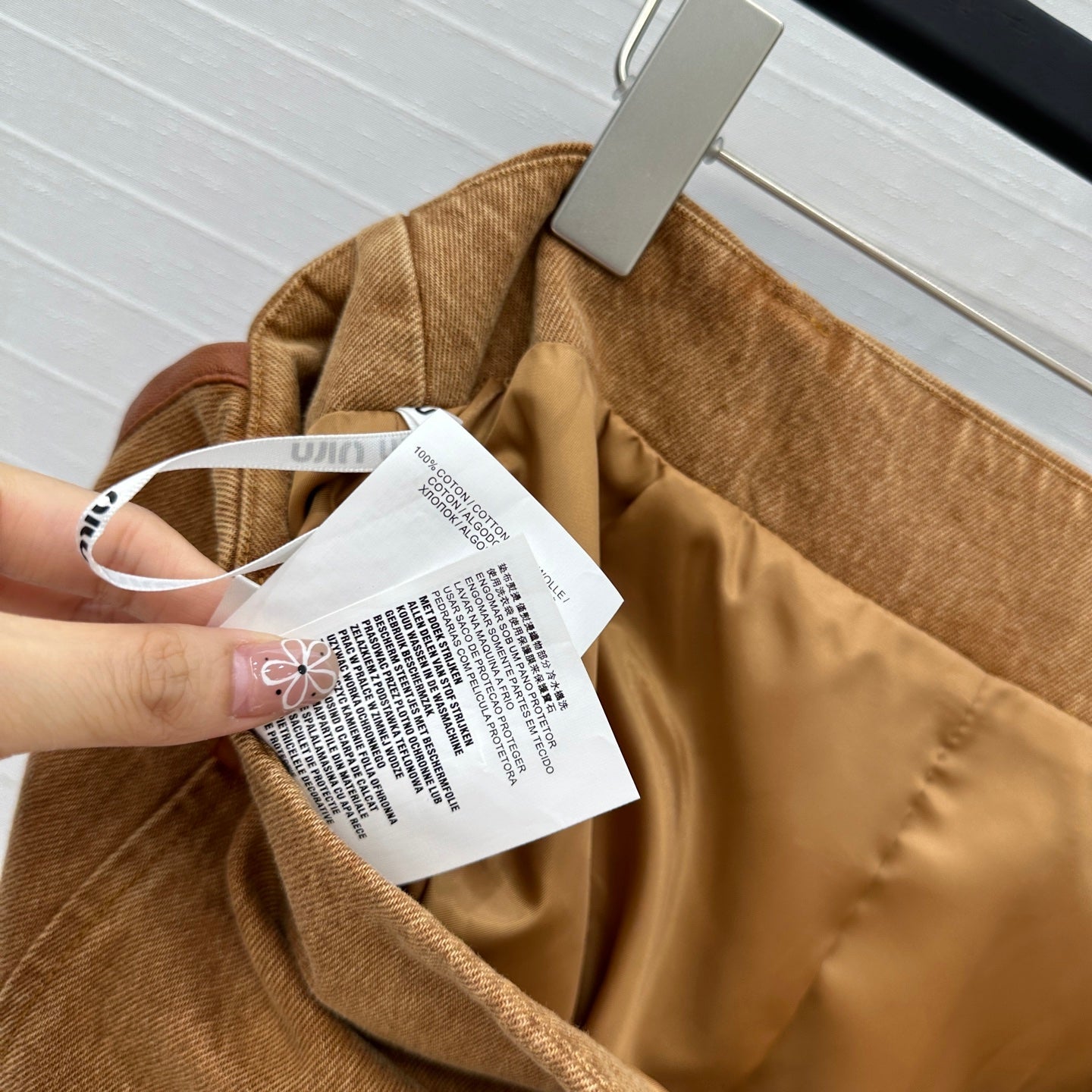 25 Egg white leather wrap around low waisted denim half skirt that