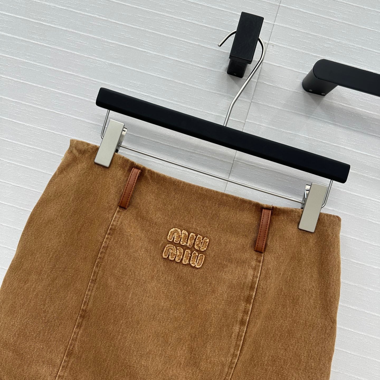 25 Egg white leather wrap around low waisted denim half skirt that