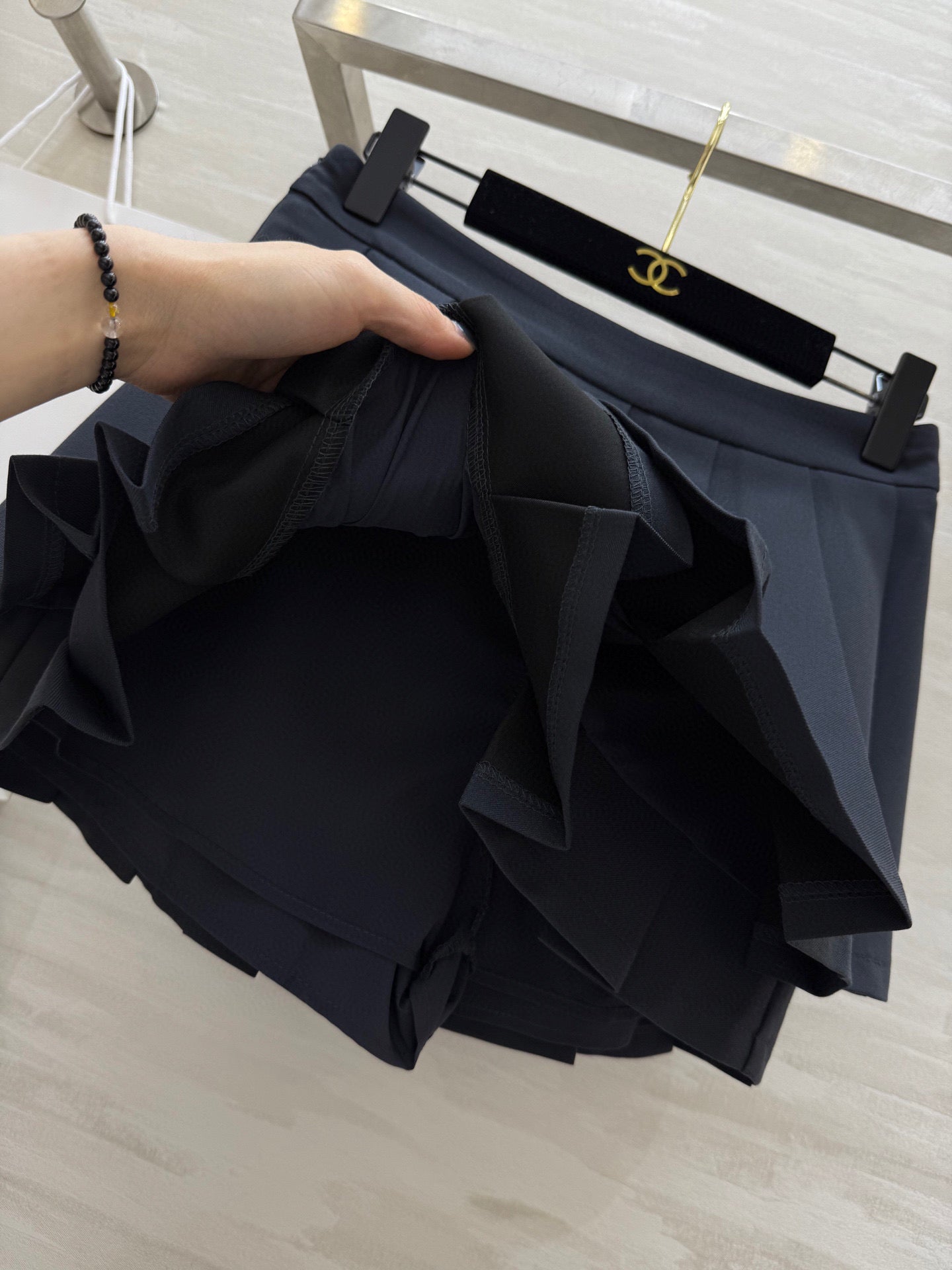 P 25 Pleated half skirt Short skirt