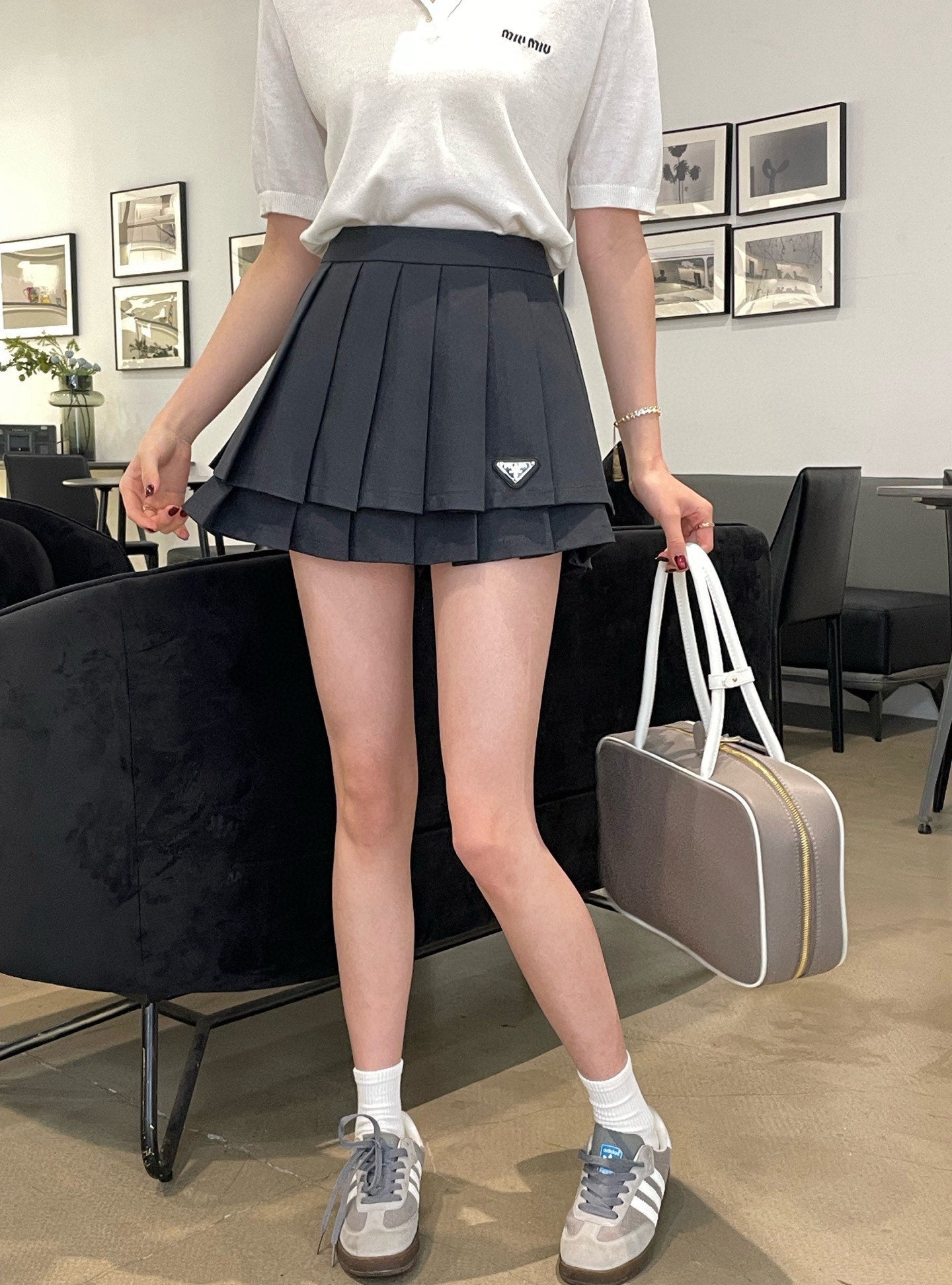 P 25 Pleated half skirt Short skirt