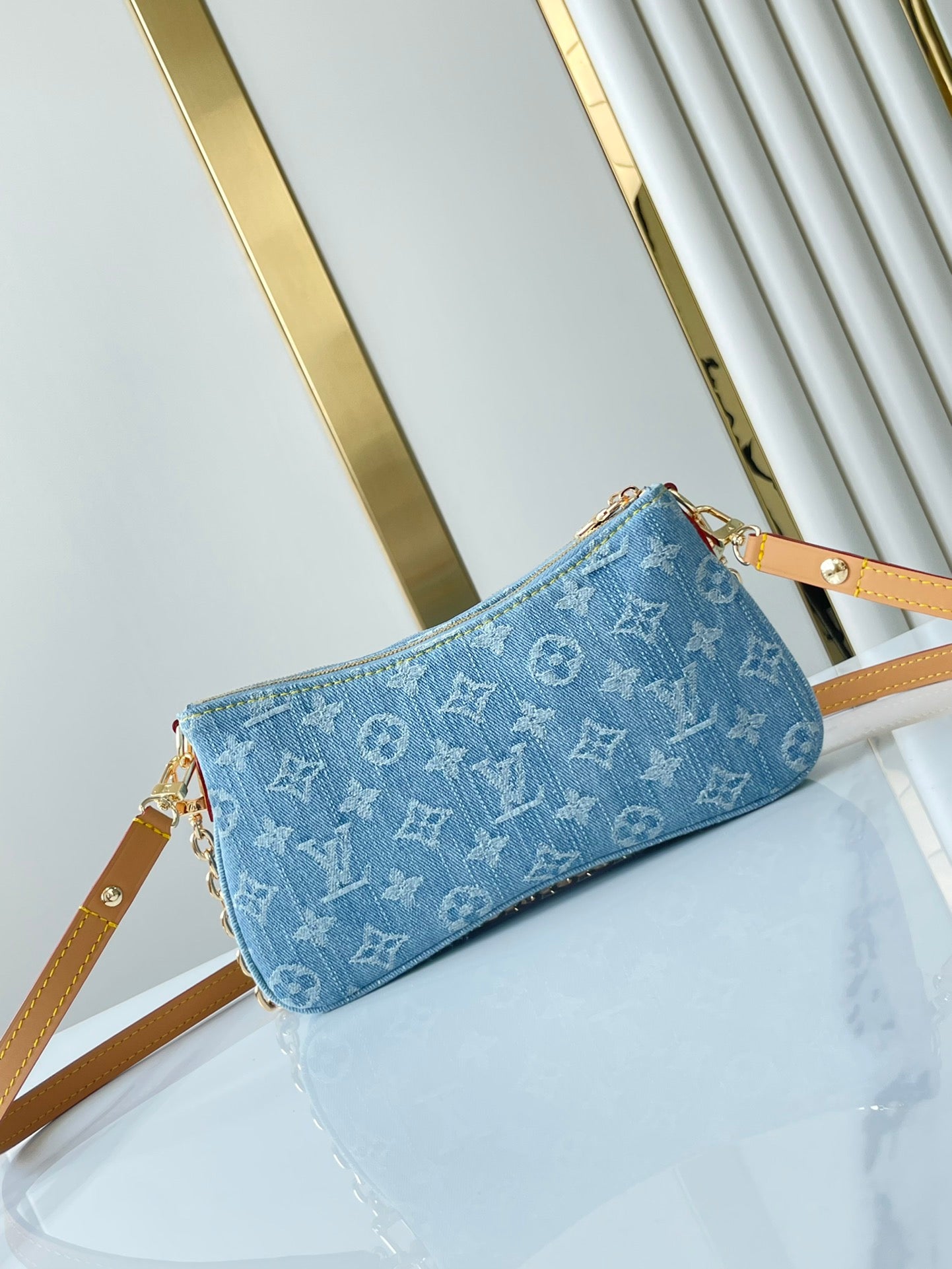 POCHETTE 24 IN BLUE MONOGRAM DENIM GOLD HARDWARE