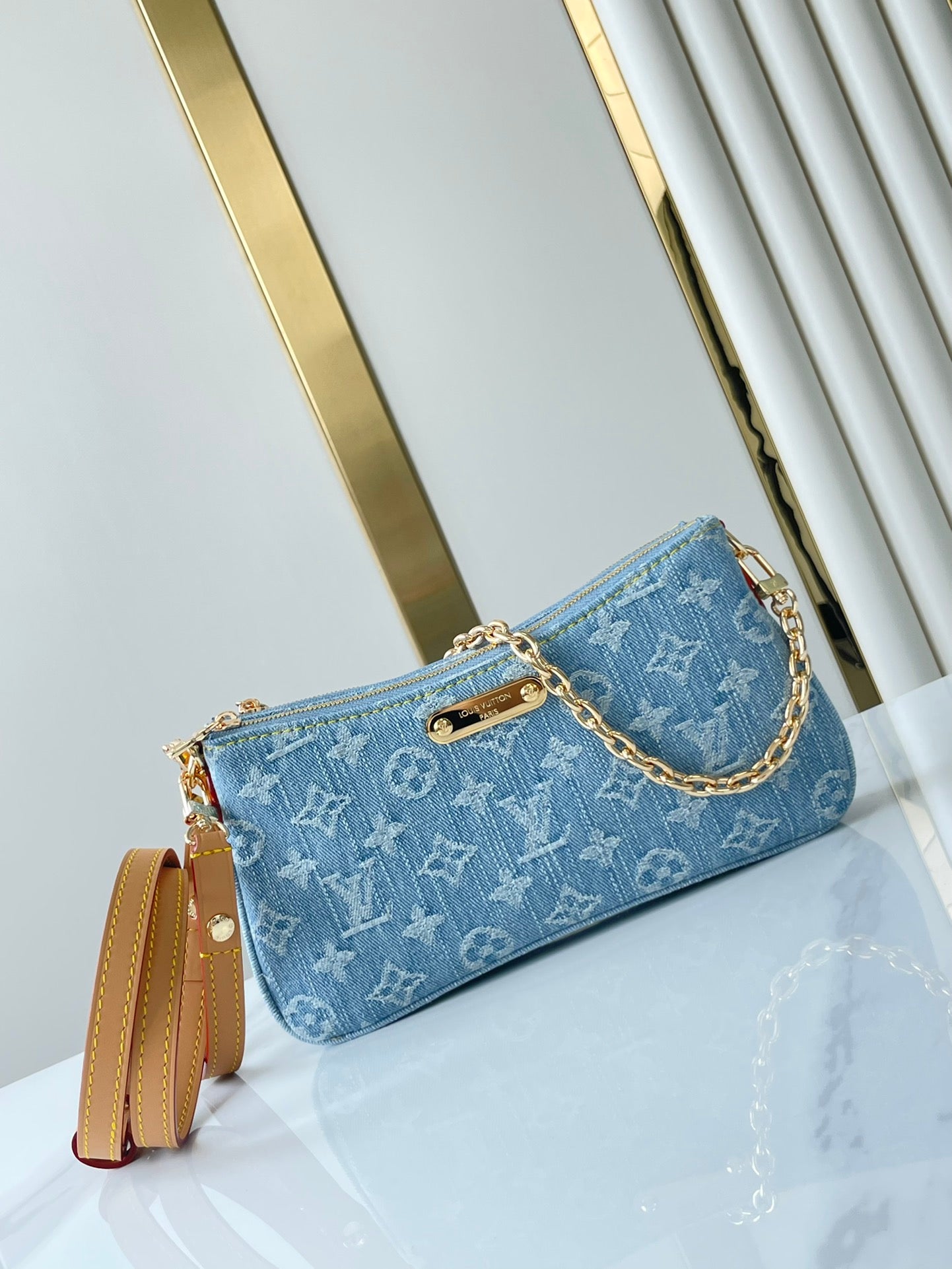 POCHETTE 24 IN BLUE MONOGRAM DENIM GOLD HARDWARE