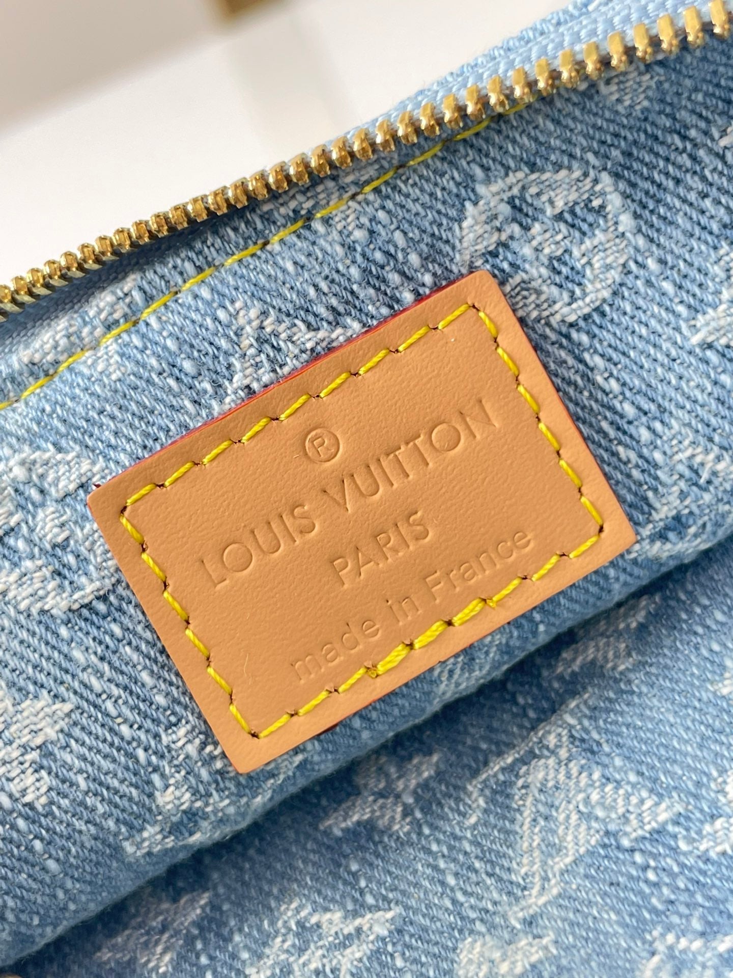 POCHETTE 24 IN BLUE MONOGRAM DENIM GOLD HARDWARE