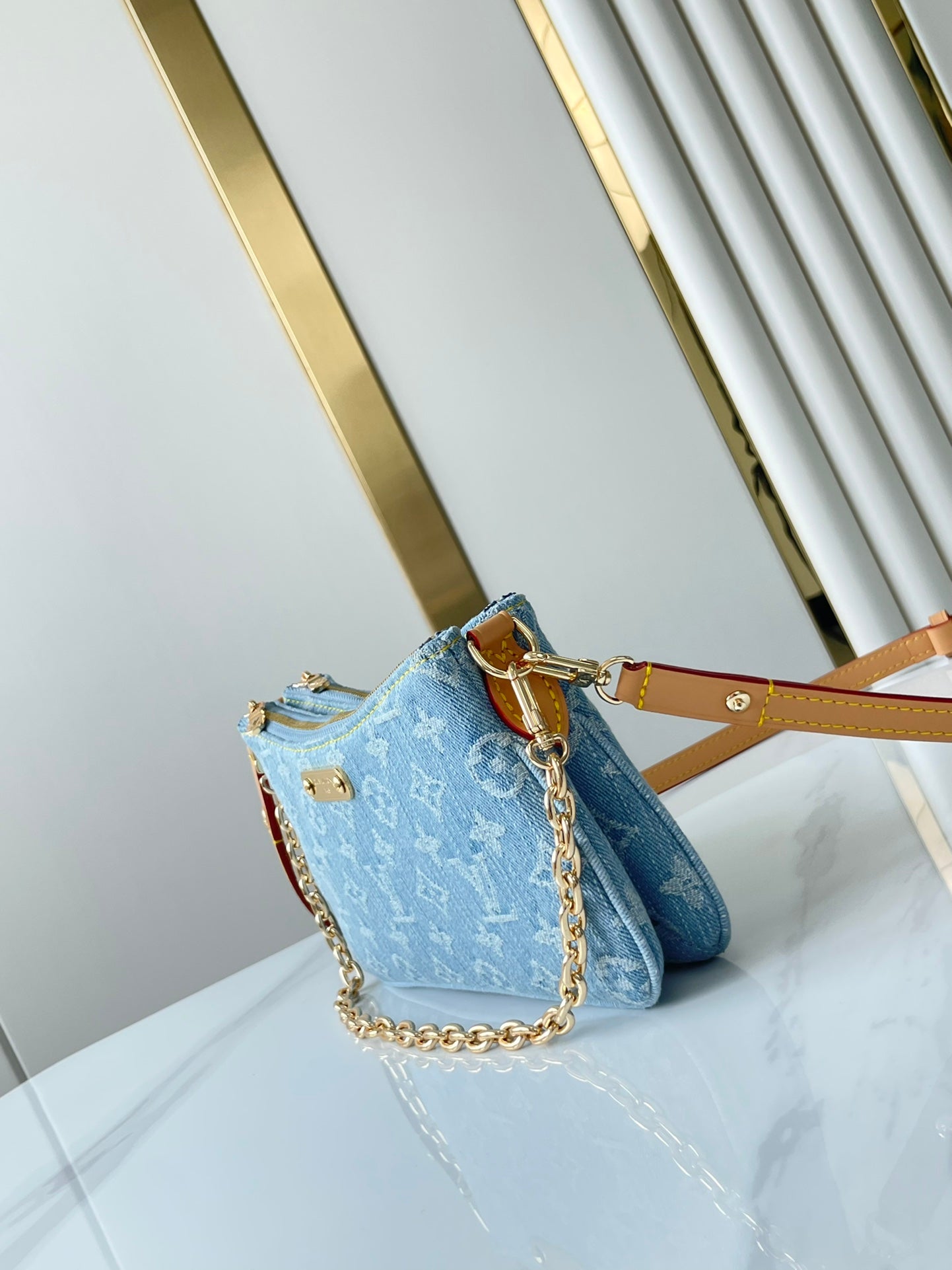 POCHETTE 24 IN BLUE MONOGRAM DENIM GOLD HARDWARE
