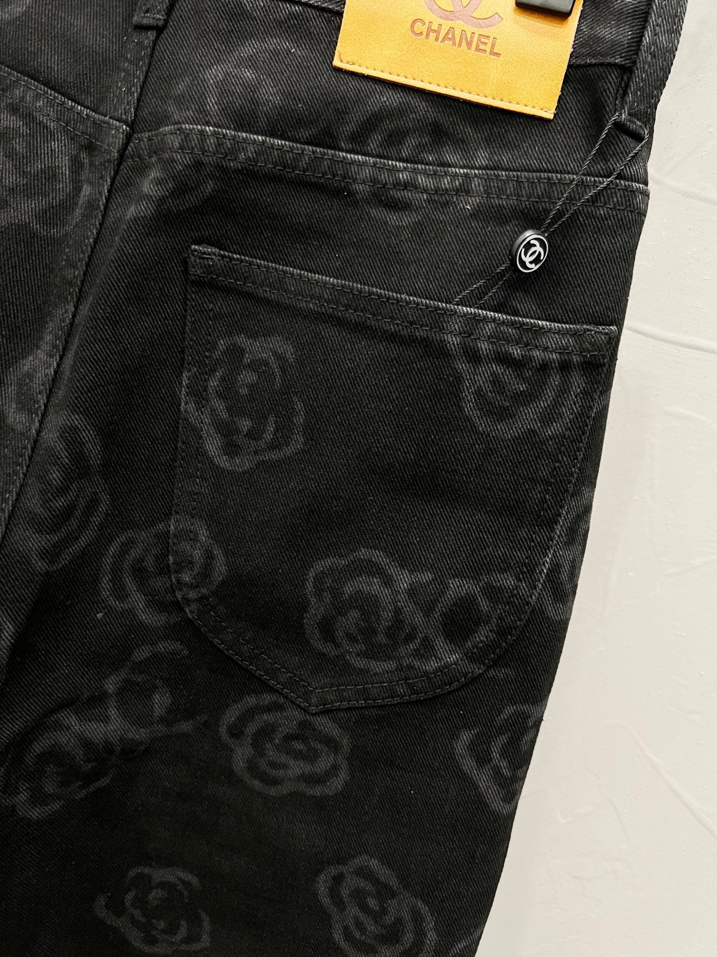 C Classic cross-chain camellia logo jeans