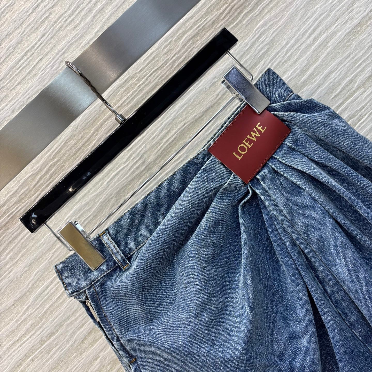 25ss wide-leg denim trousers with crinkled logo and leather trim