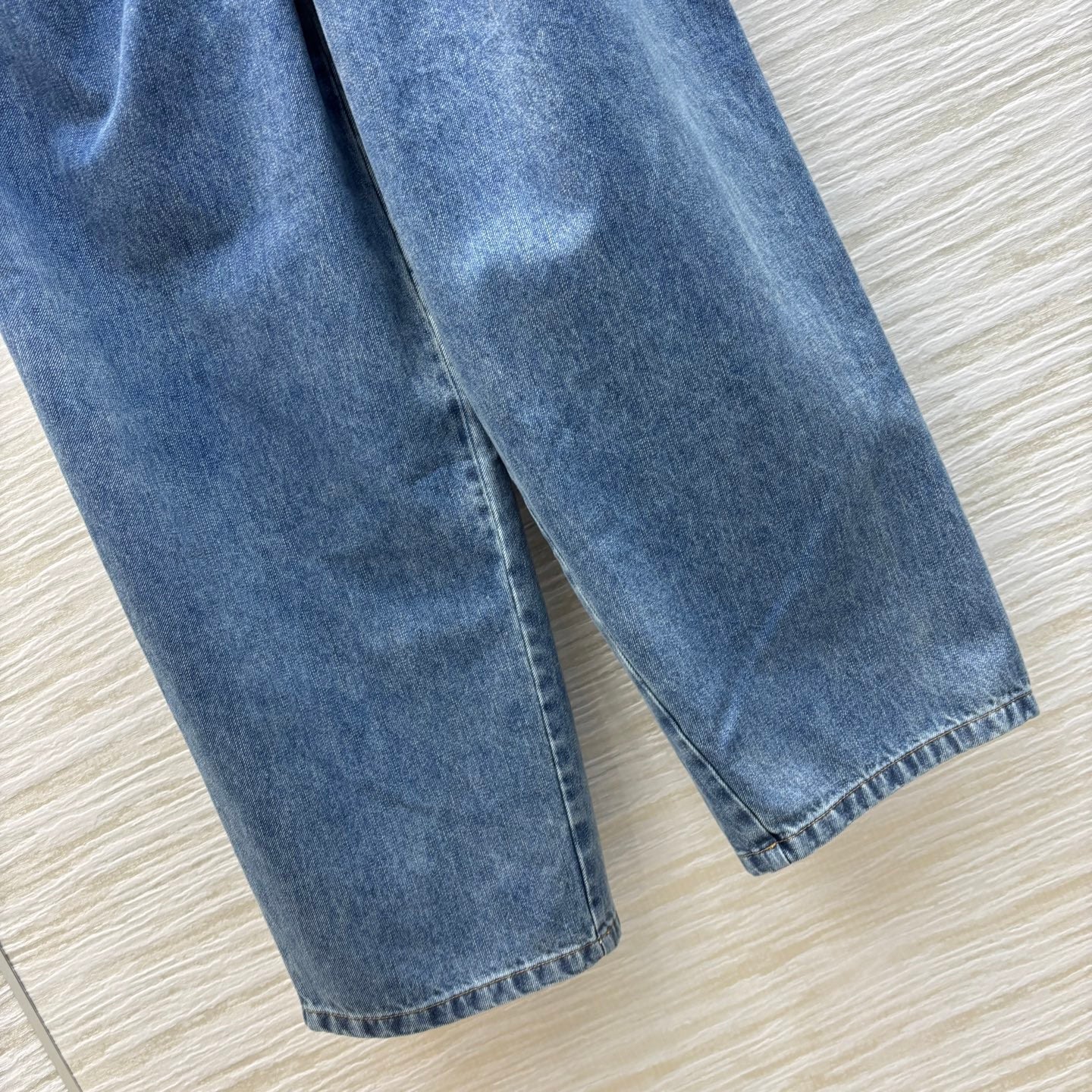 25ss wide-leg denim trousers with crinkled logo and leather trim