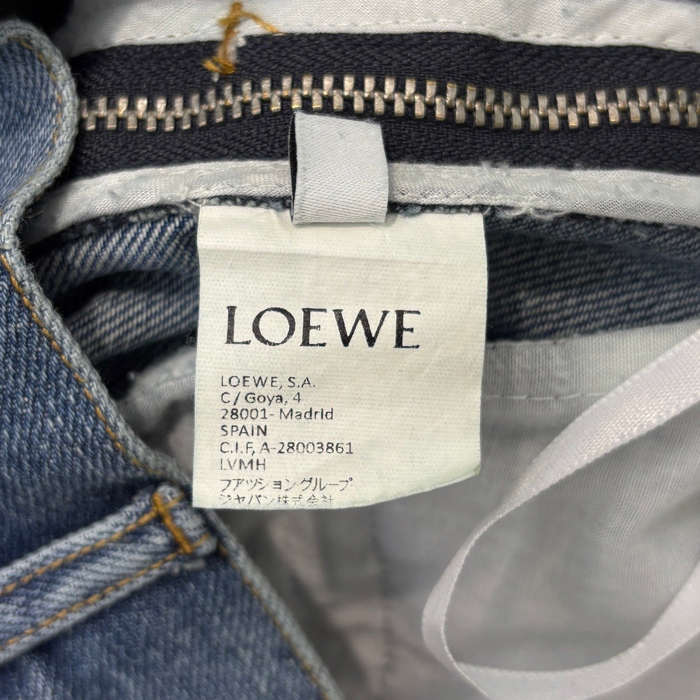 25ss wide-leg denim trousers with crinkled logo and leather trim