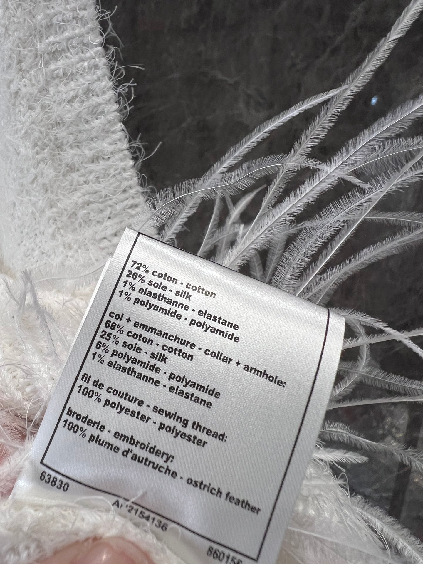25ss watercolor white feathers stitched backbone