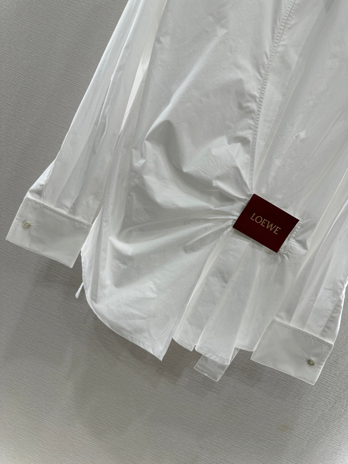 L 25 Irregular Leather Tag Shirt