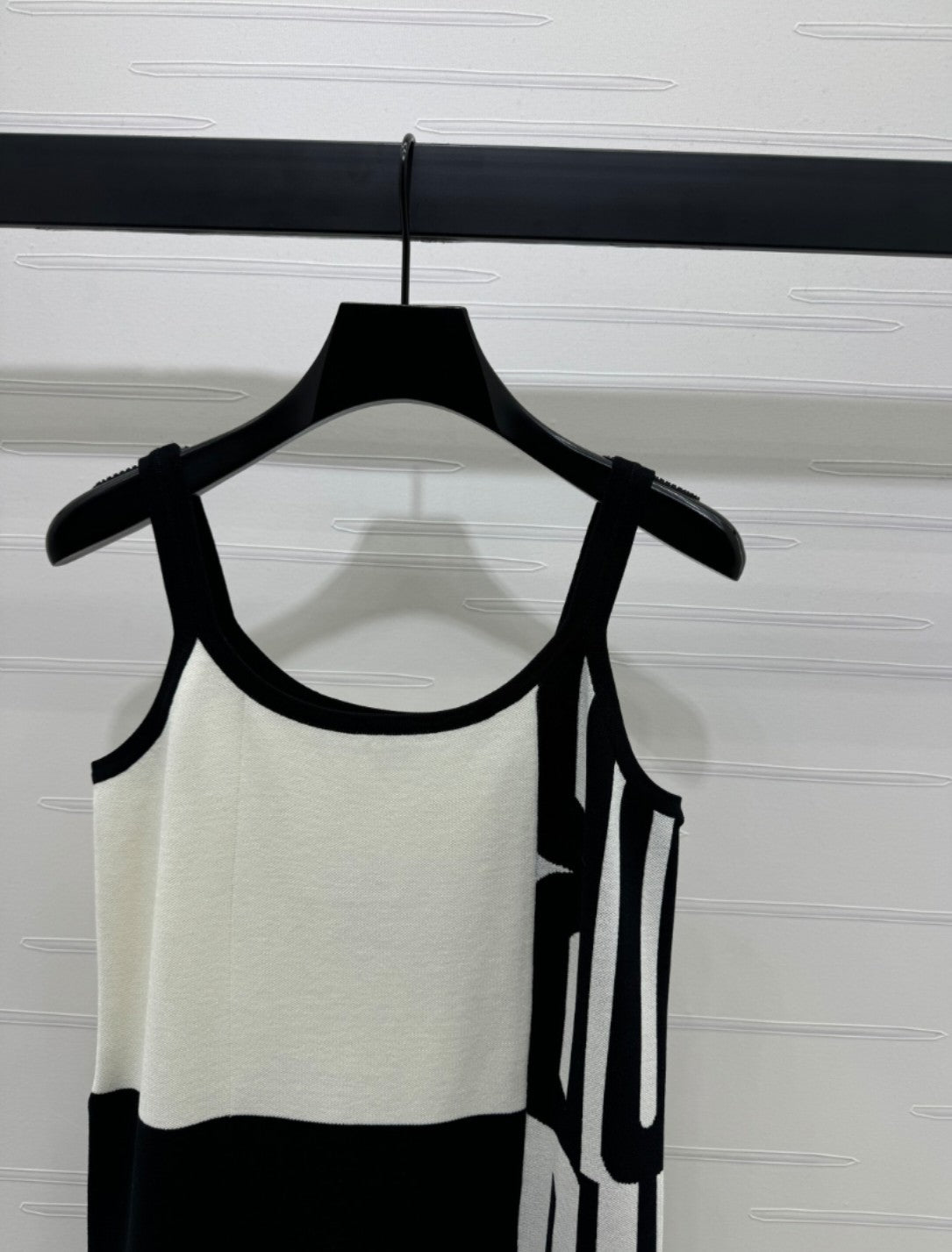 25 sling-back knit dress