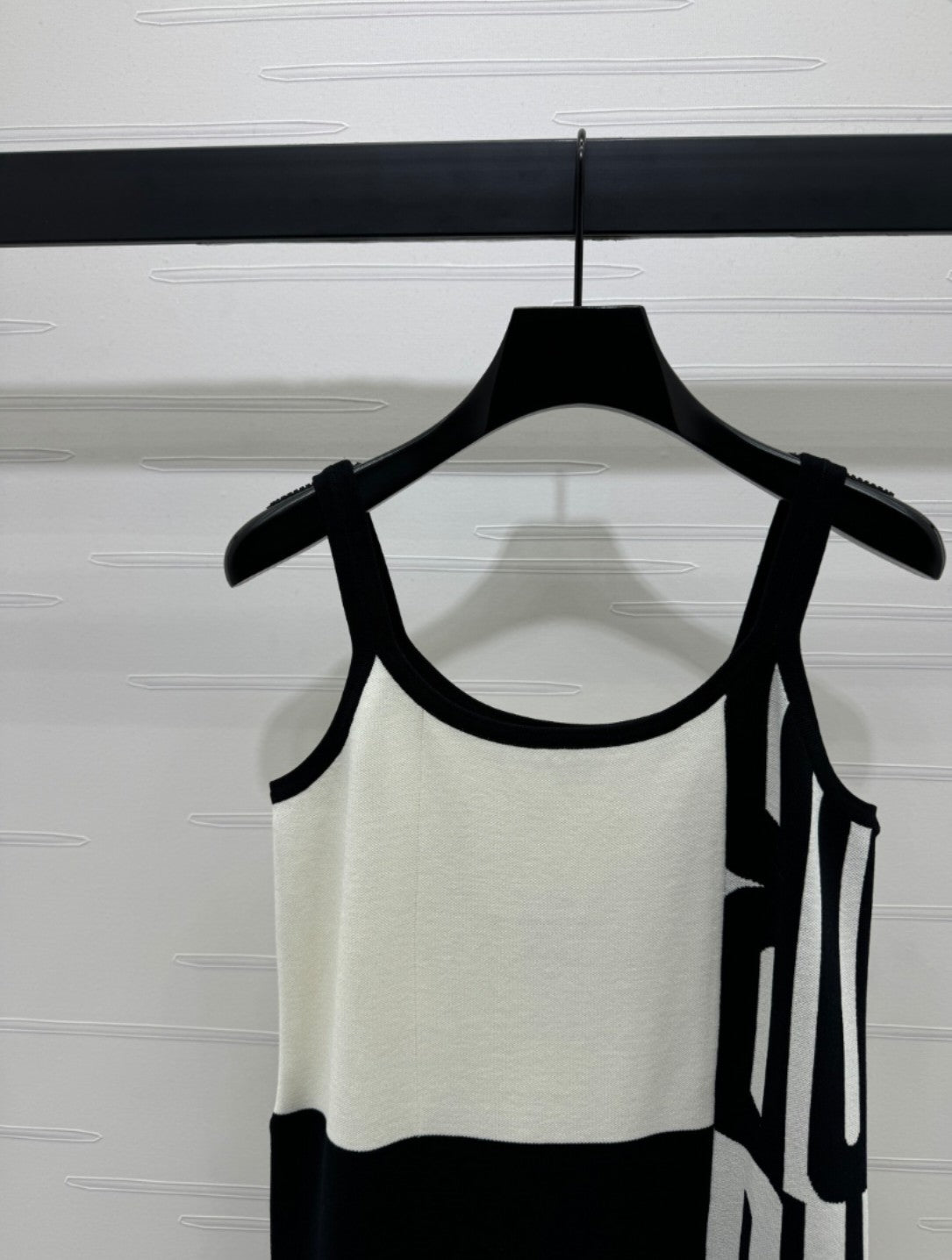 25 sling-back knit dress