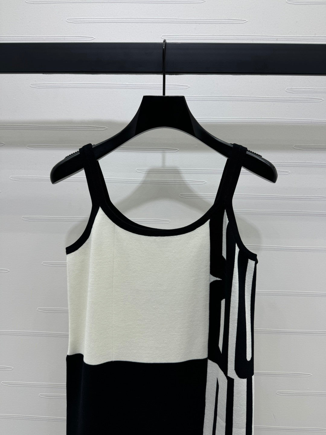 25 sling-back knit dress