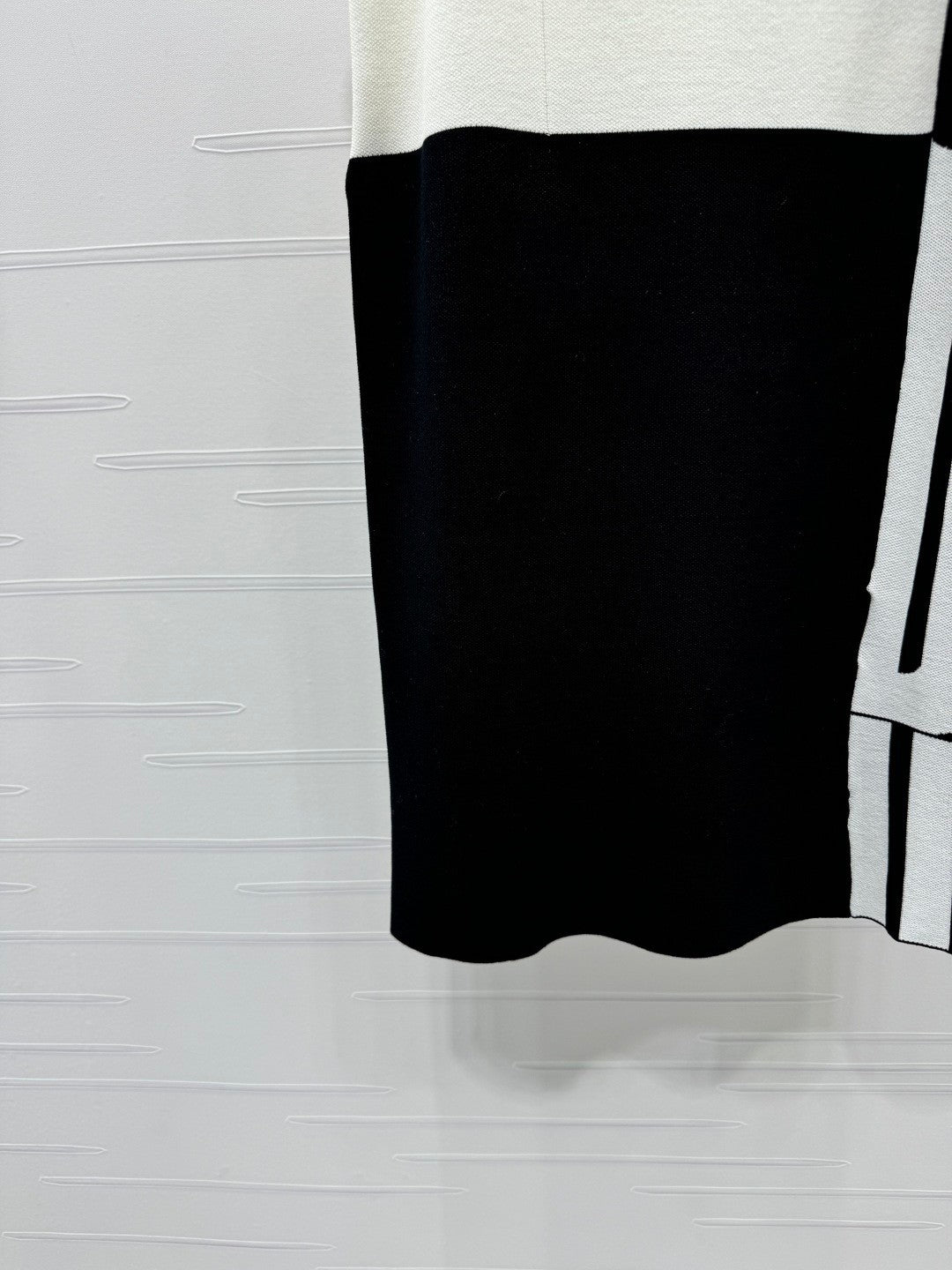 25 sling-back knit dress