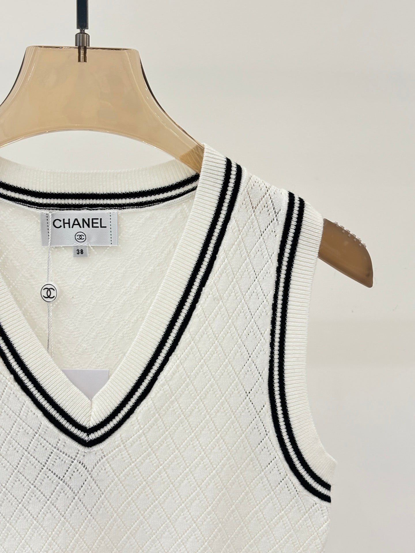 25 White Knit Vest
