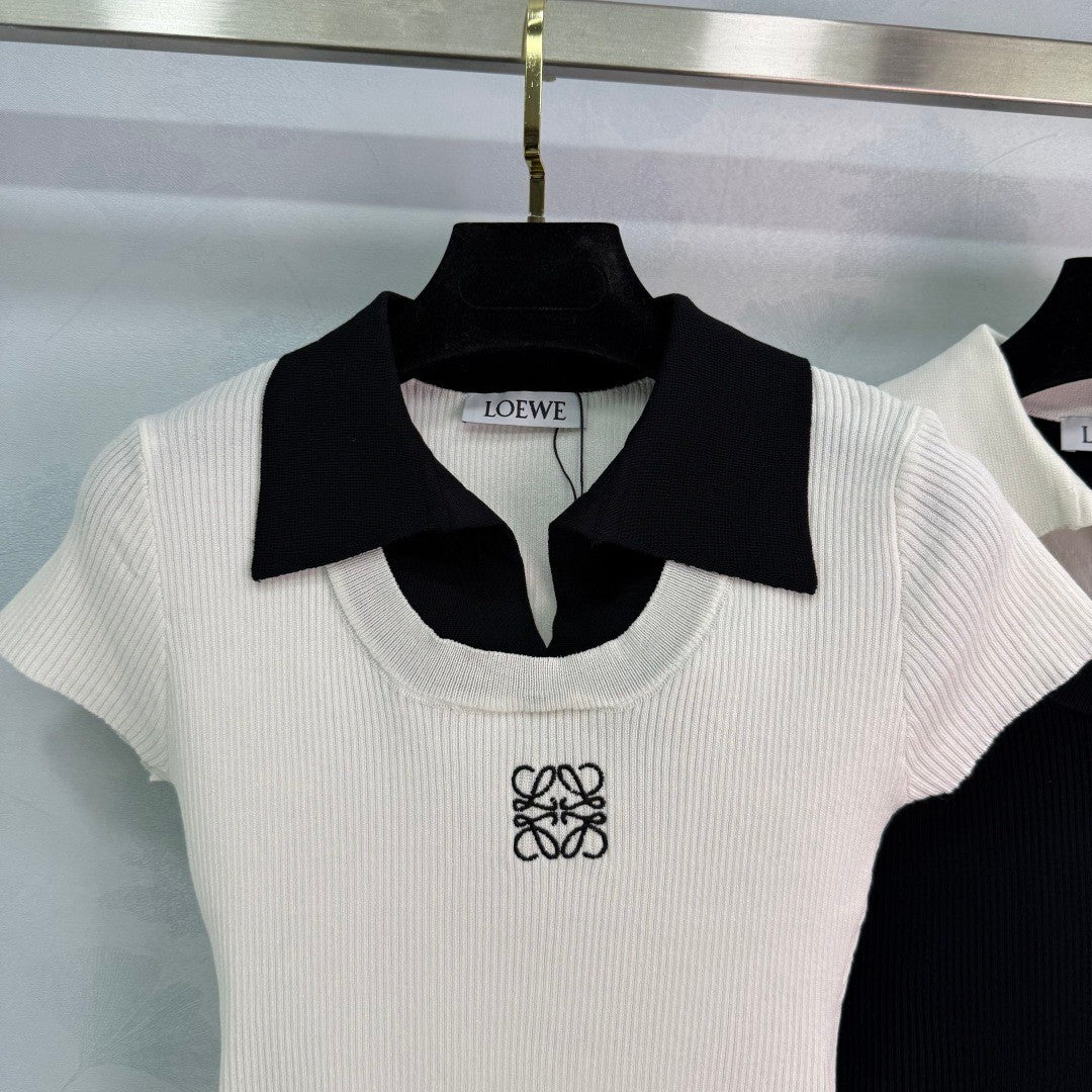 25 Short sleeved fake two-piece knitted top)