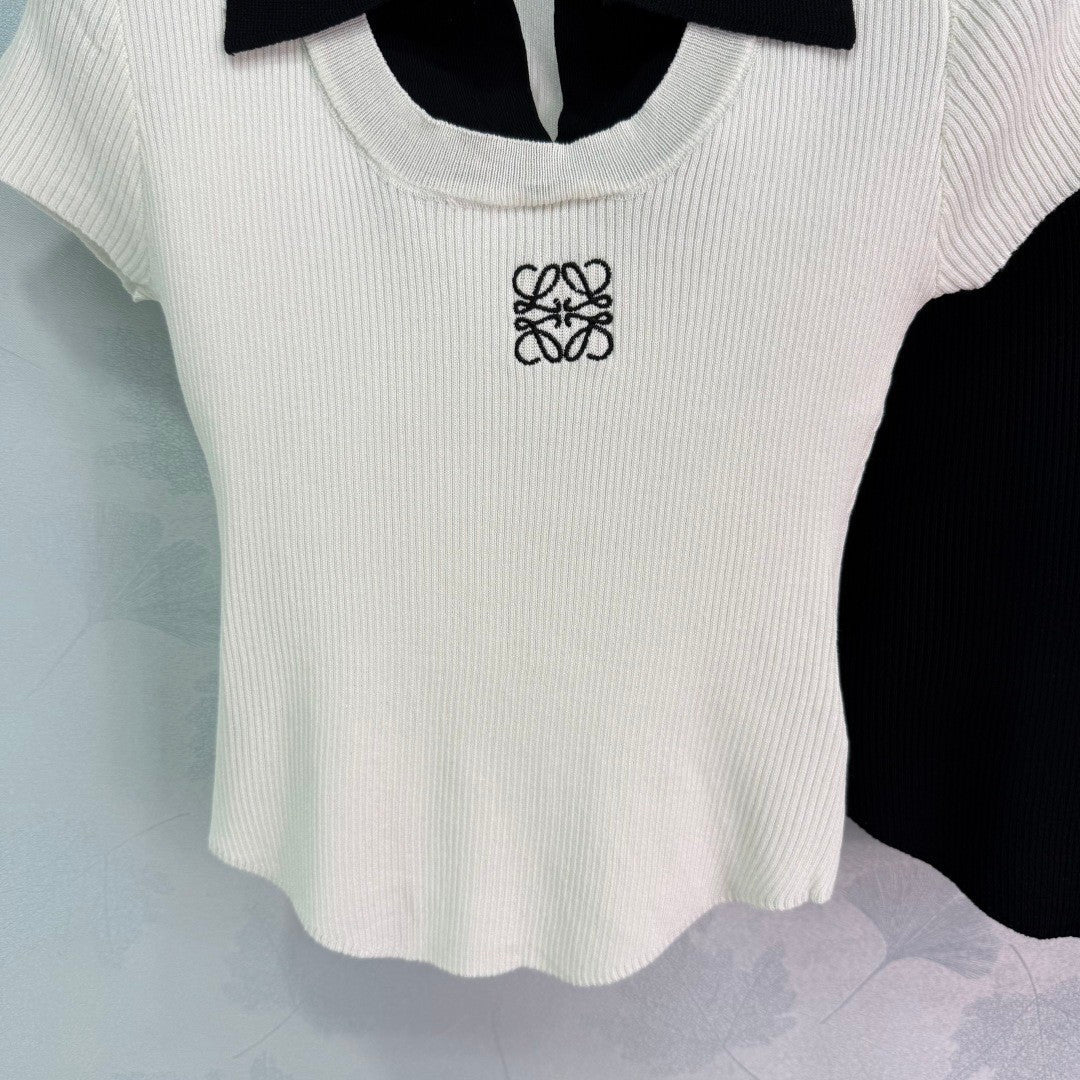 25 Short sleeved fake two-piece knitted top)