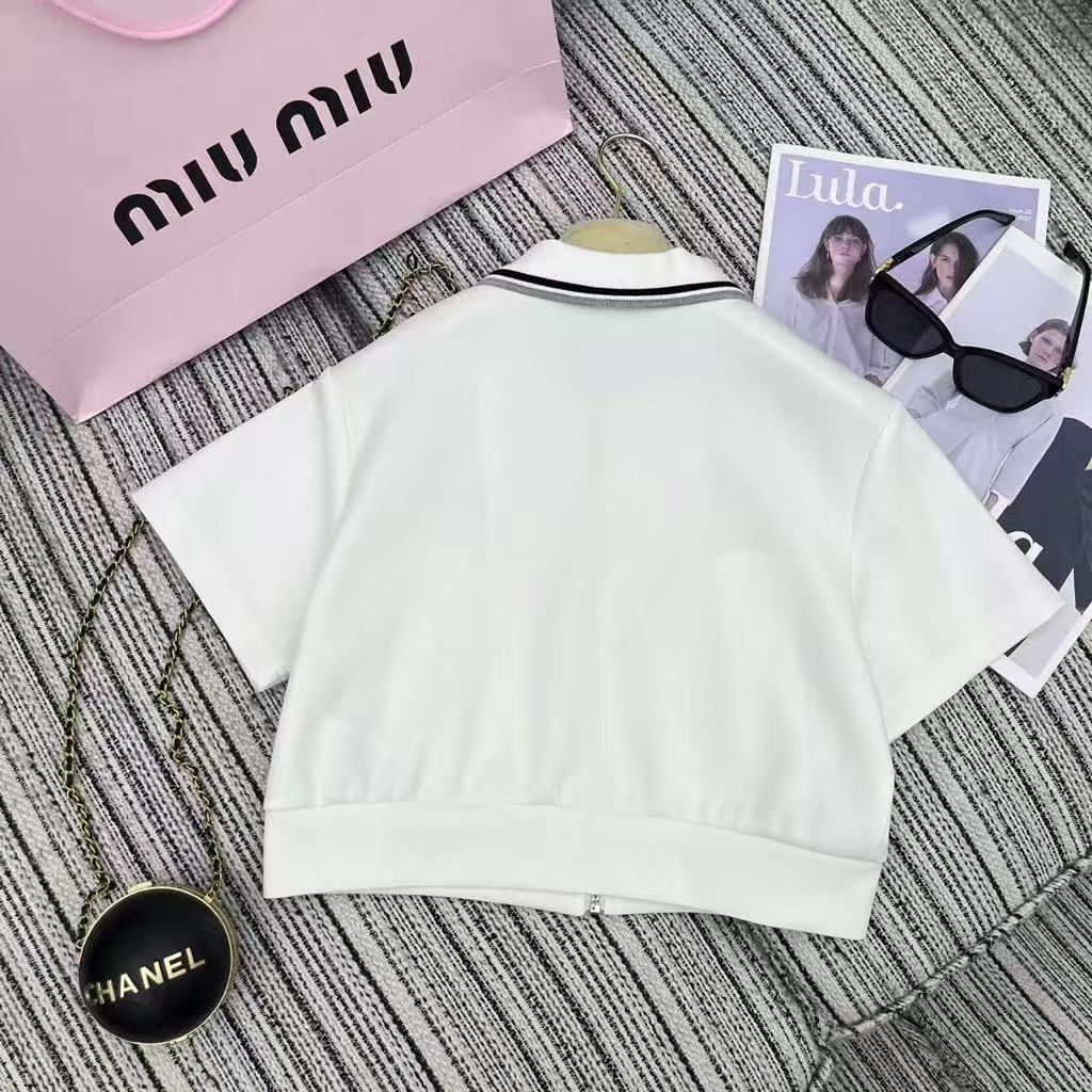 25ss New color blocked edge lapel short sleeved top paired with elastic waist short skirt set