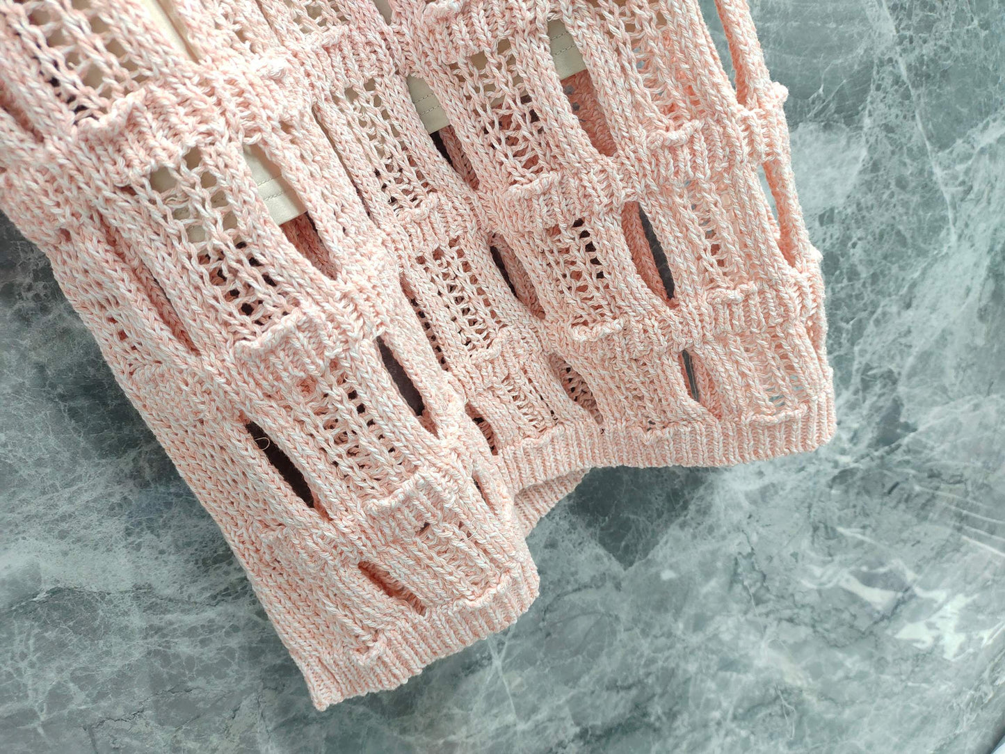 25 light pink knit cutout dress