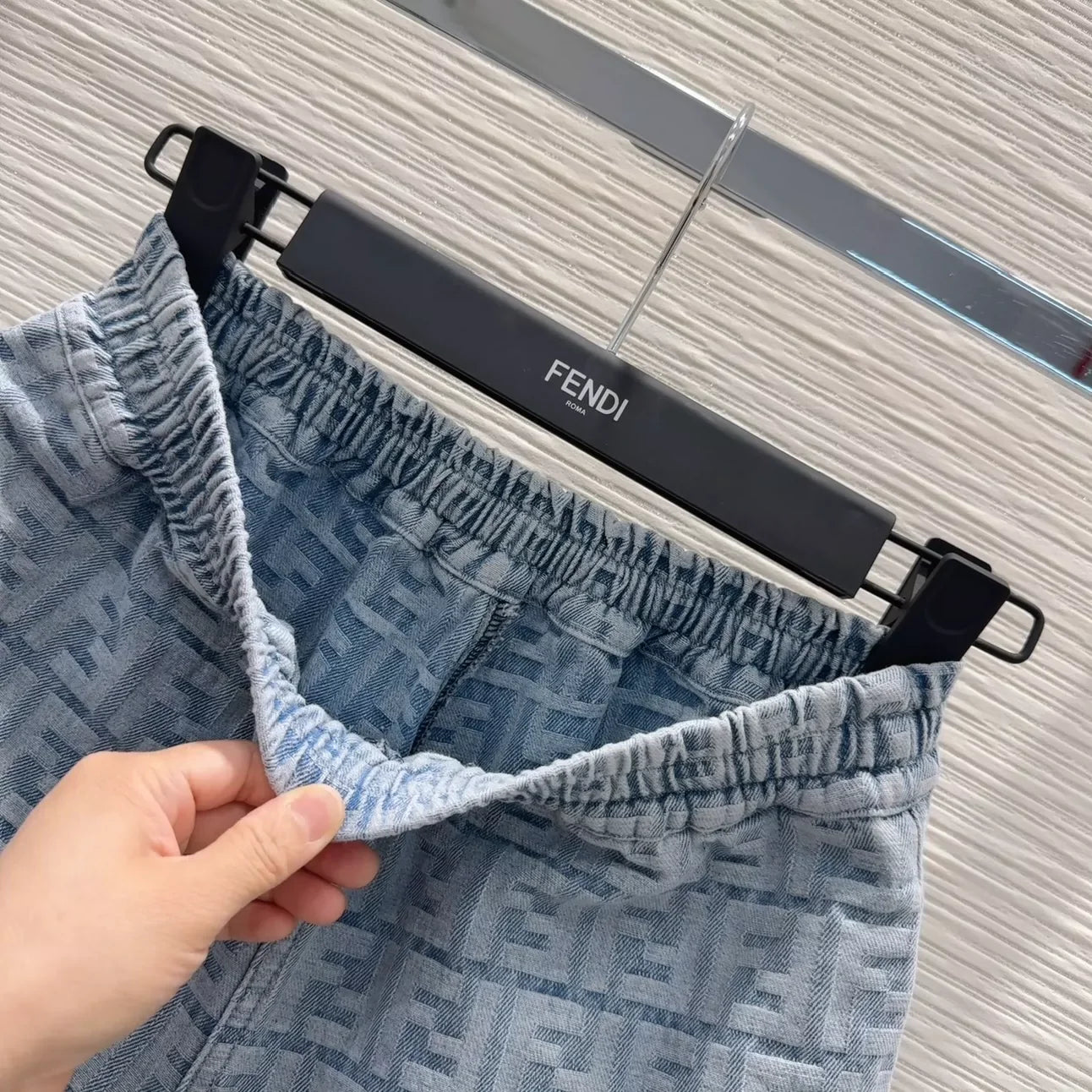 F 25 New monogrammed jacquard denim shorts