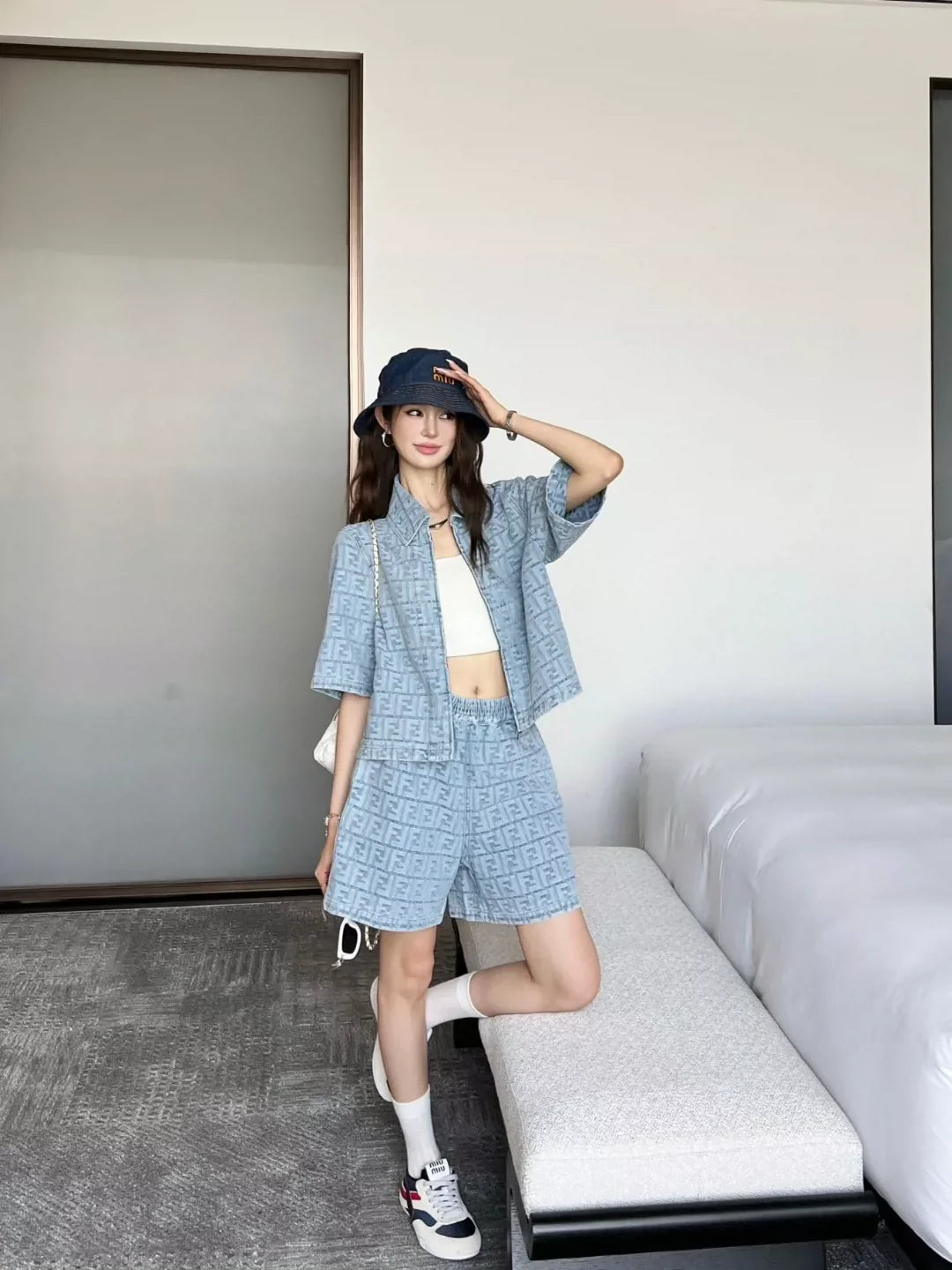 F 25 New monogrammed jacquard denim shorts
