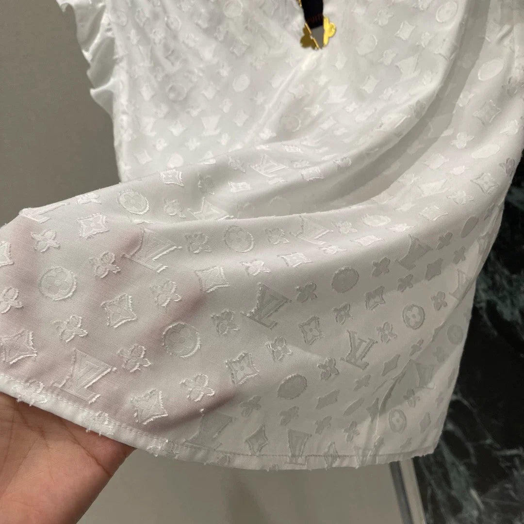 L 25 Gold Button Ruffle Design