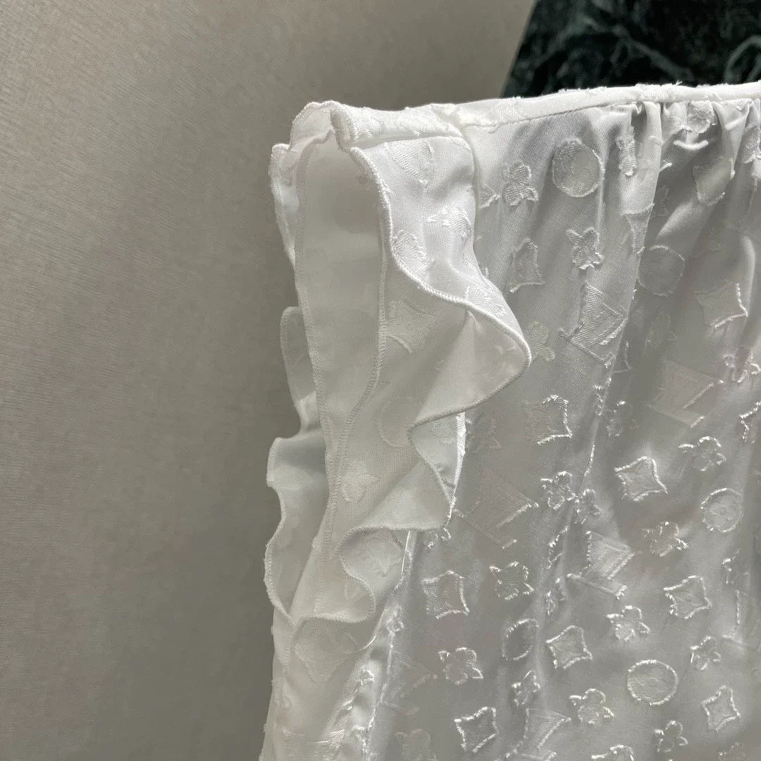 L 25 Gold Button Ruffle Design