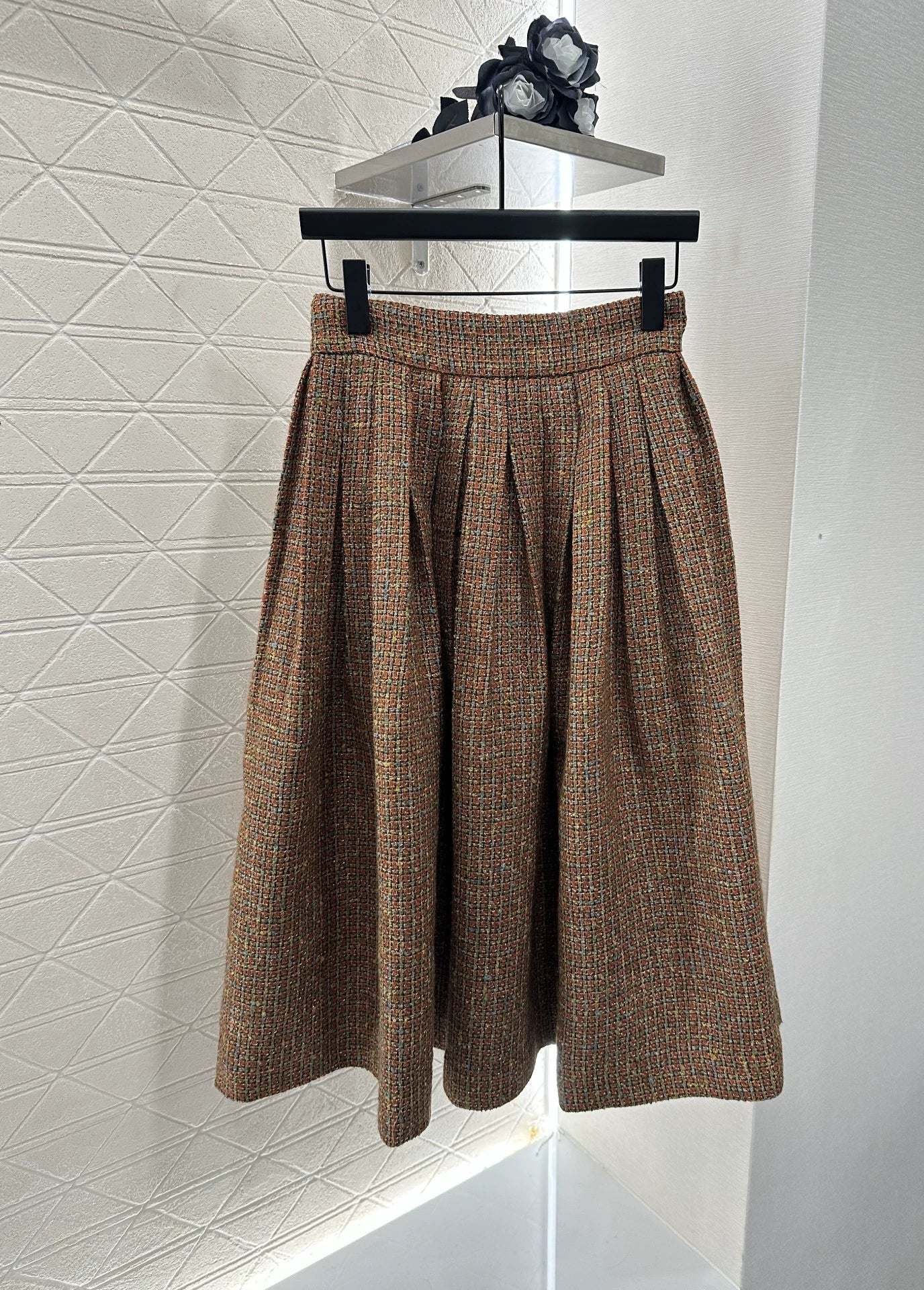 C 25 new styles featuring a lapel dress with beaded hem and skirt set.