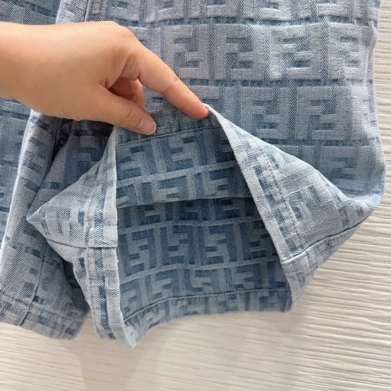 F 25 New monogrammed jacquard denim shorts