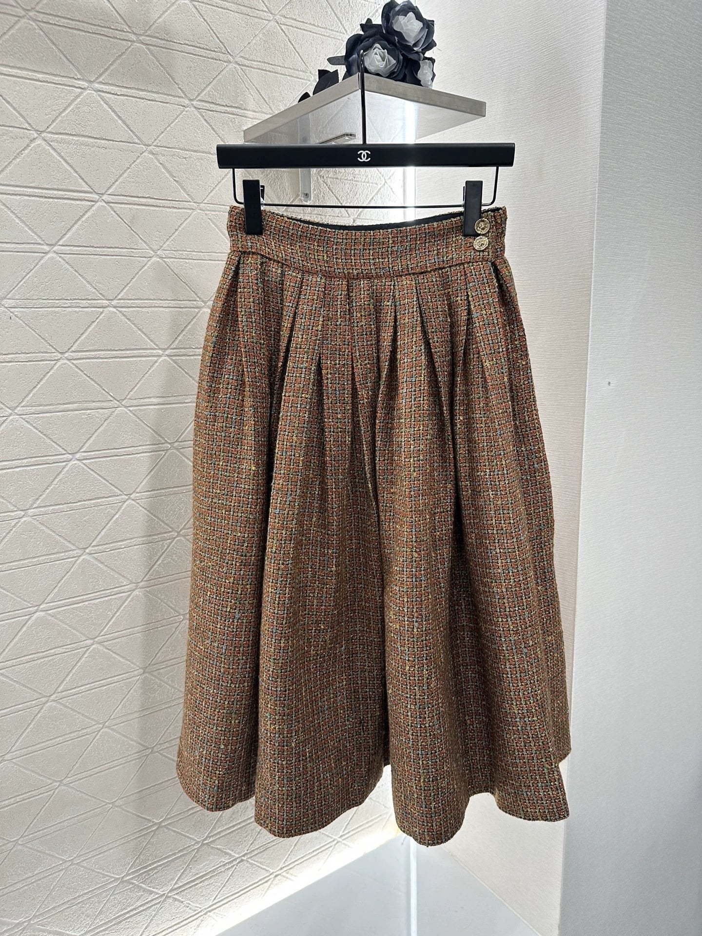 C 25 new styles featuring a lapel dress with beaded hem and skirt set.