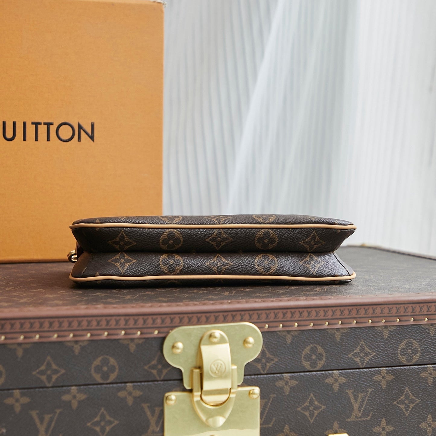 POCHETTE 24 IN BROWN MONOGRAM CANVAS GOLD HARDWARE
