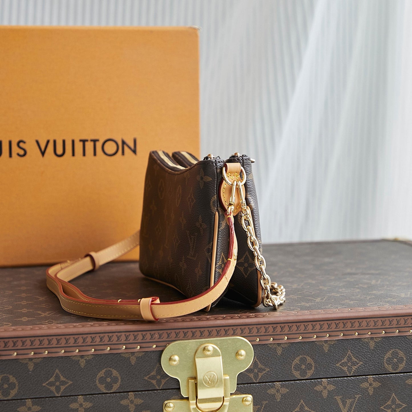 POCHETTE 24 IN BROWN MONOGRAM CANVAS GOLD HARDWARE