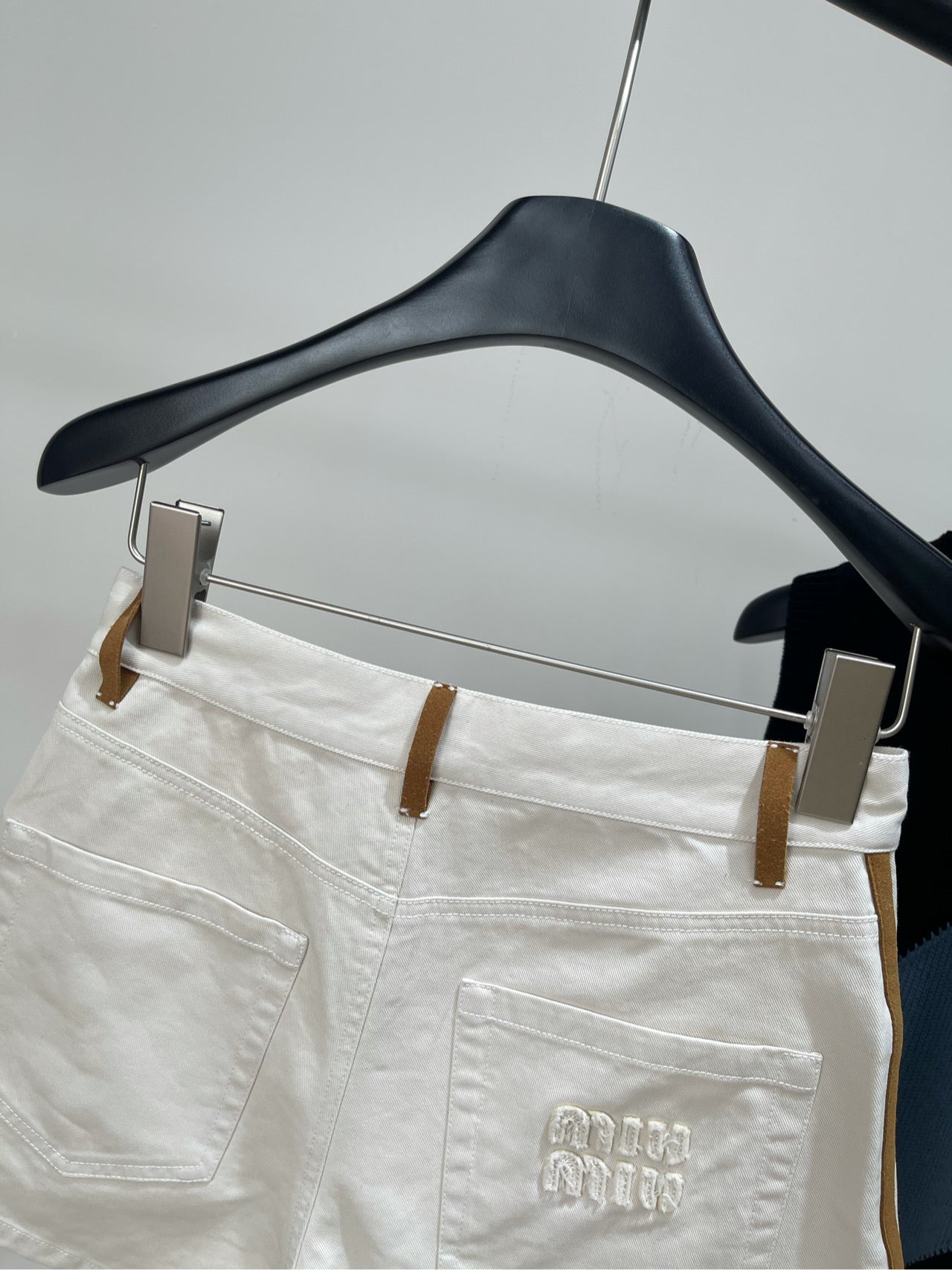 M 25 white suede velvet trim denim shorts