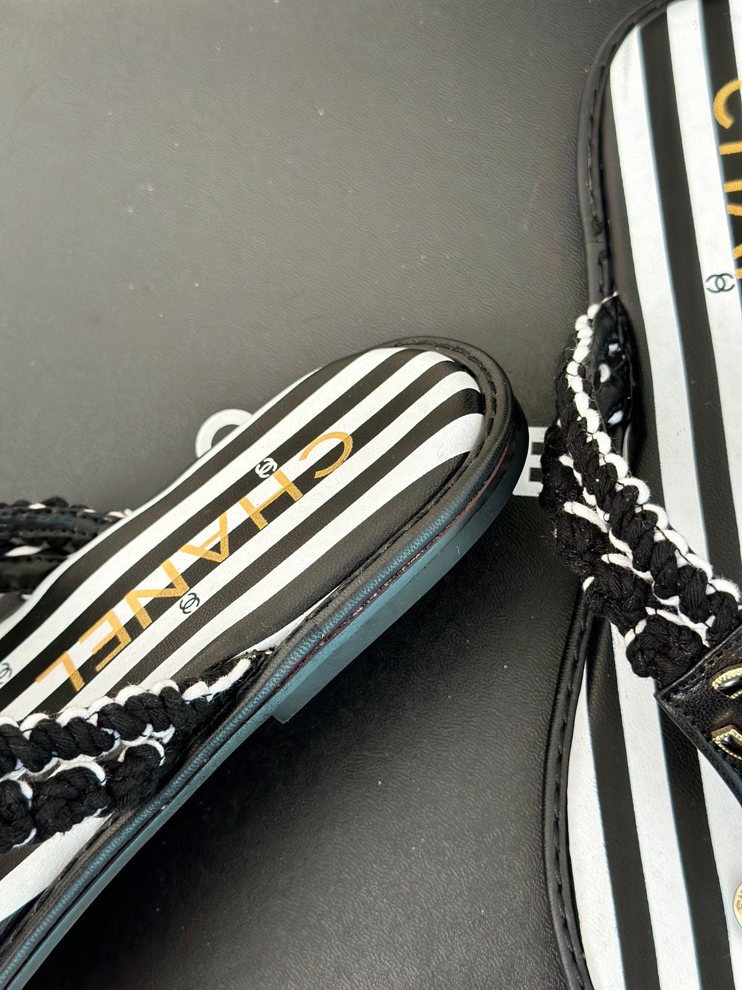 25 Thong Sandal Braided Striped Black White
