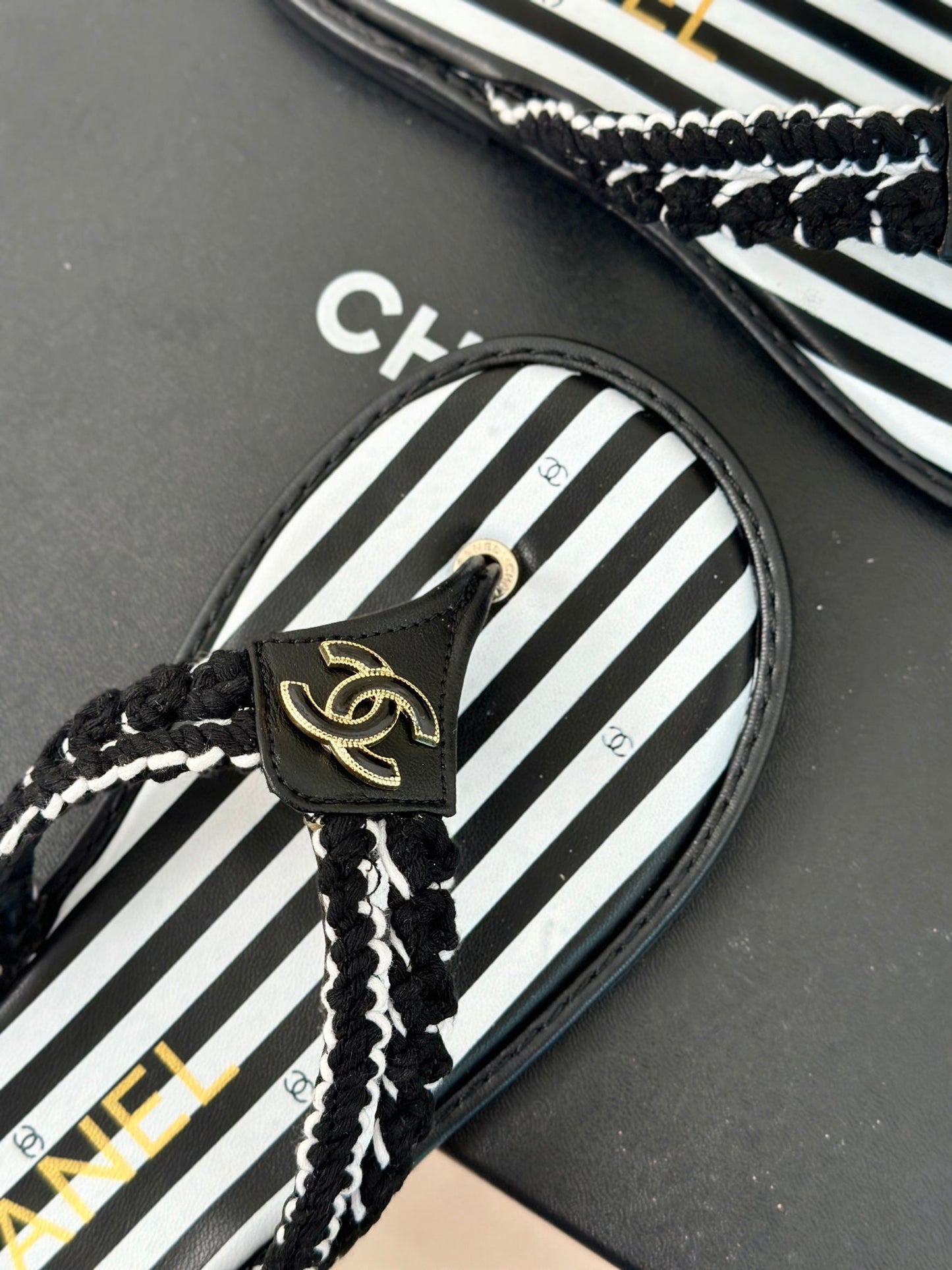 25 Thong Sandal Braided Striped Black White