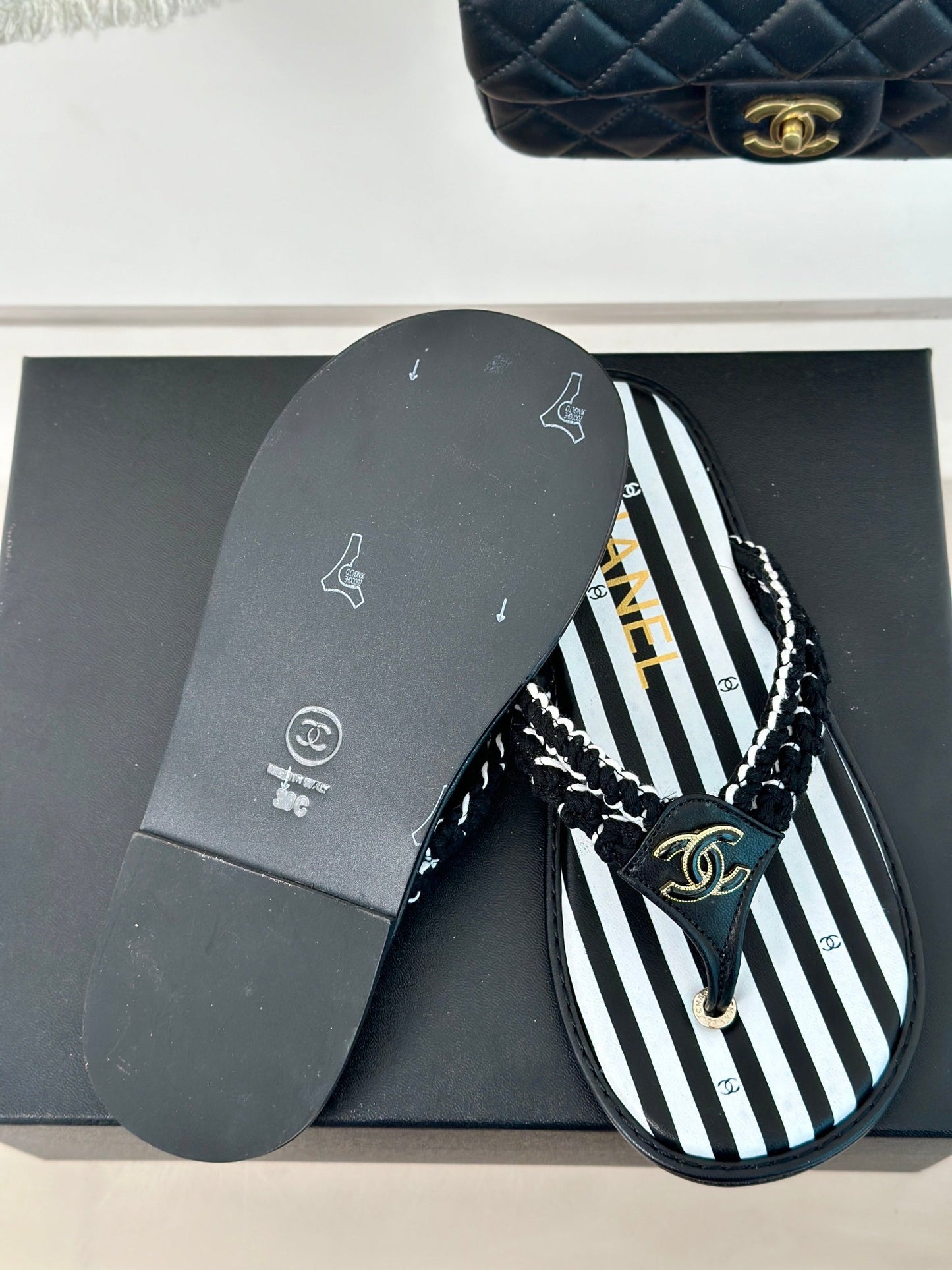 25 Thong Sandal Braided Striped Black White