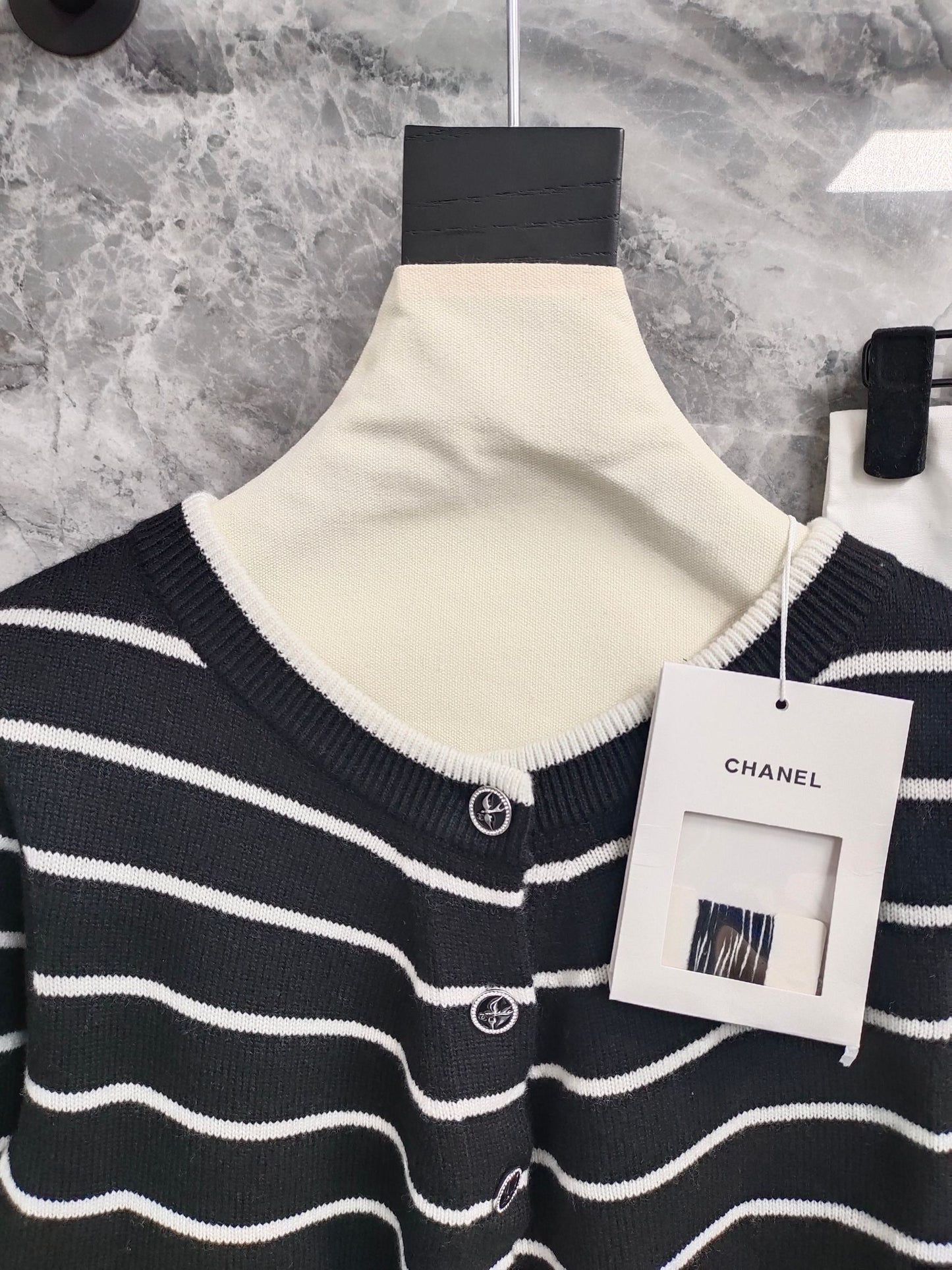 C 25 Cardigan with Swallow Buttons in Light Blue and Black