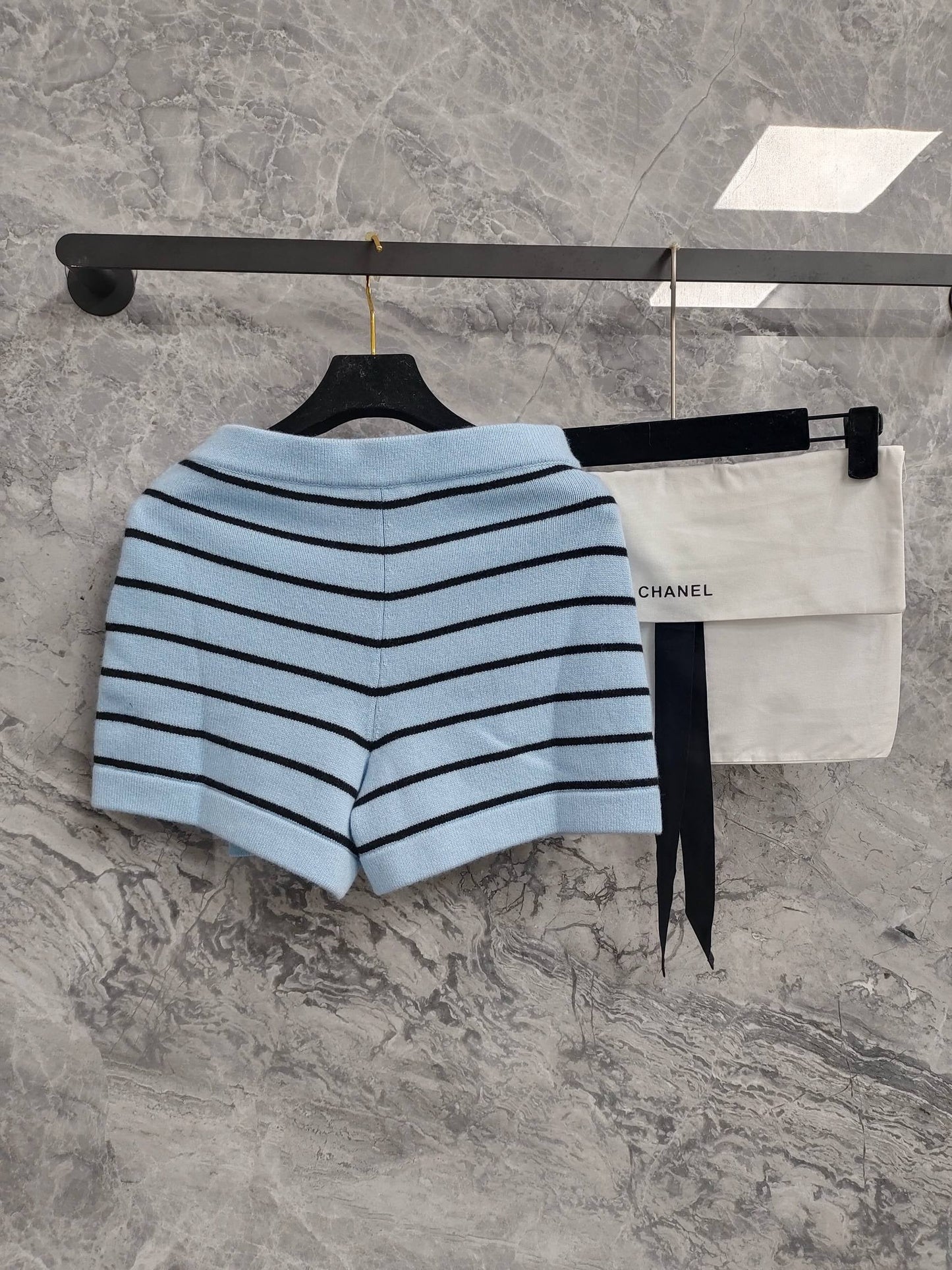 C 25 Light blue and black striped Swallow buttons short skirt
