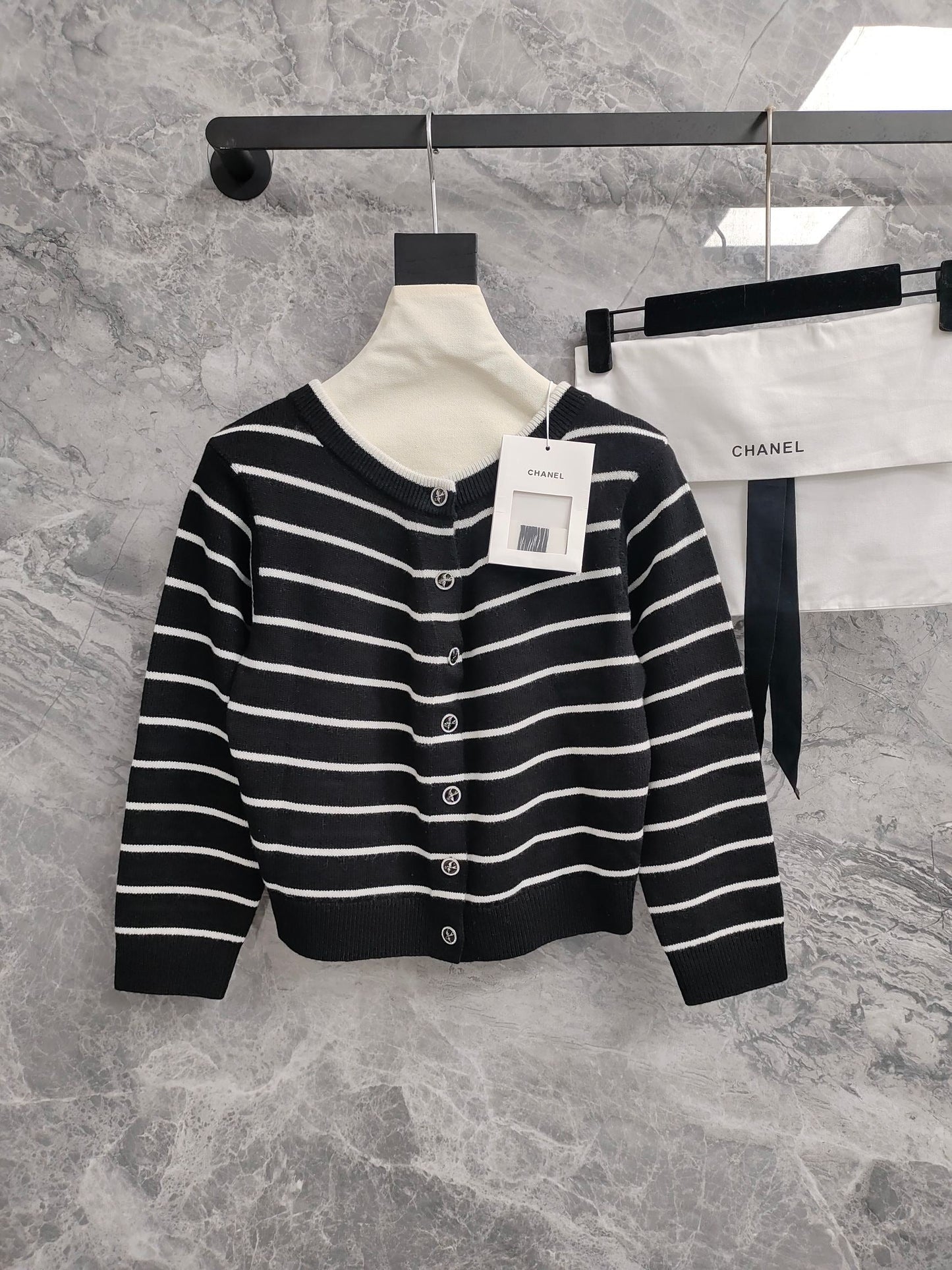 C 25 Cardigan with Swallow Buttons in Light Blue and Black