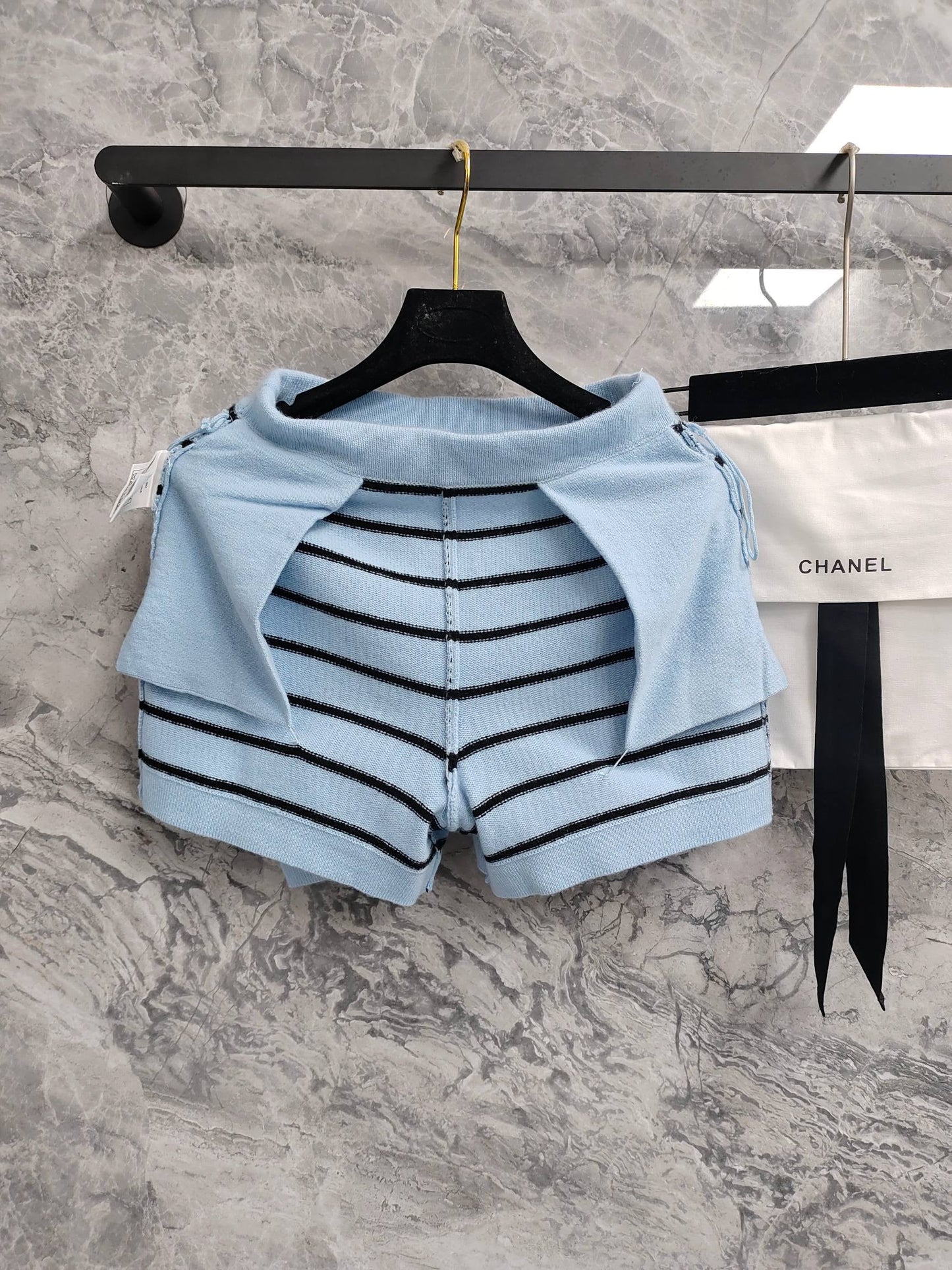 C 25 Light blue and black striped Swallow buttons short skirt