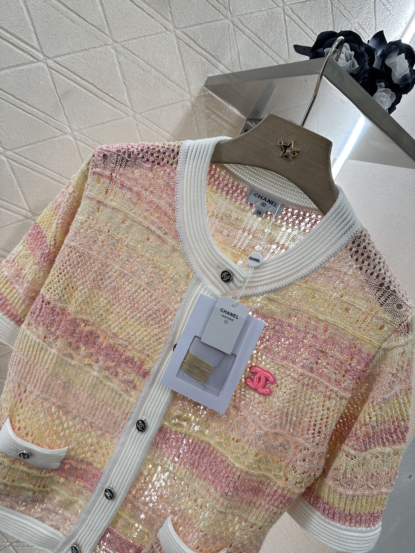 25 new product Hollow knitted cardigan