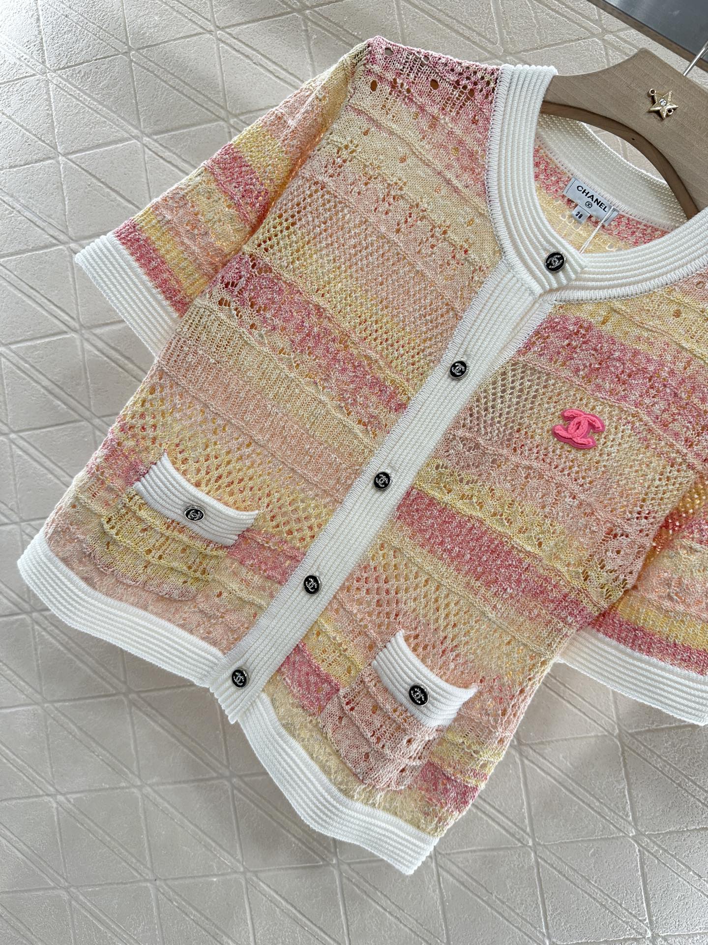 25 new product Hollow knitted cardigan