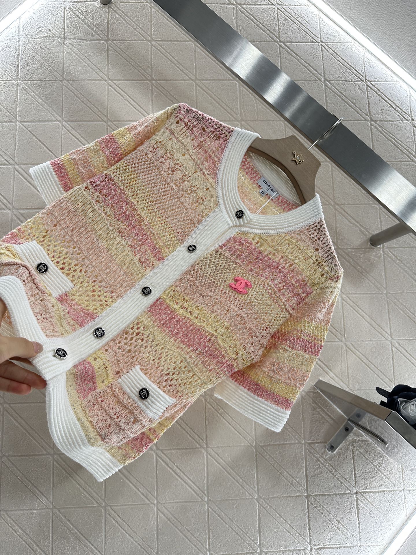 25 new product Hollow knitted cardigan