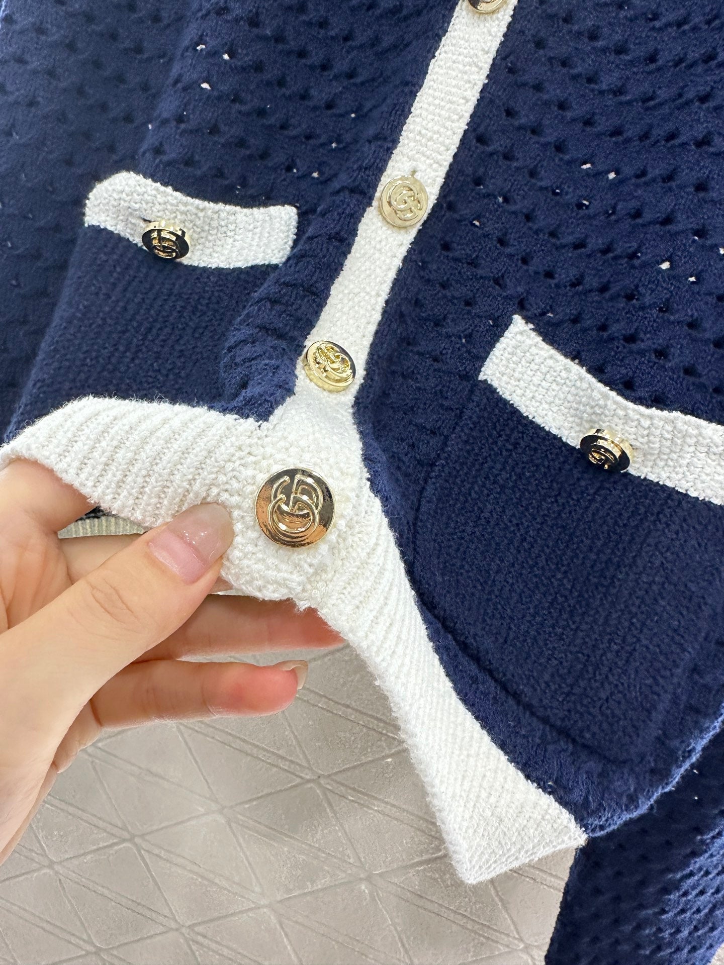 25 new product Hollow knitted cardigan