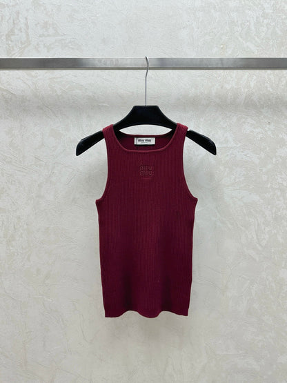 Delicately embroidered lettering straps on the chest
