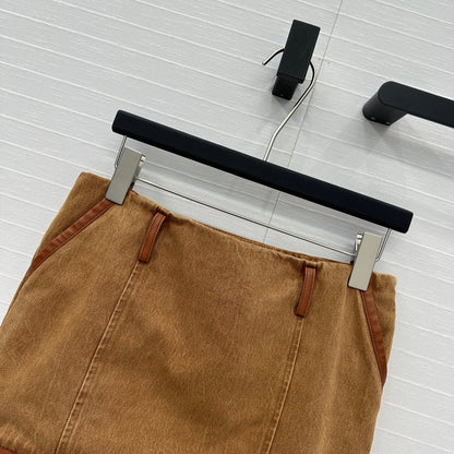 25 Egg white leather wrap around low waisted denim half skirt that
