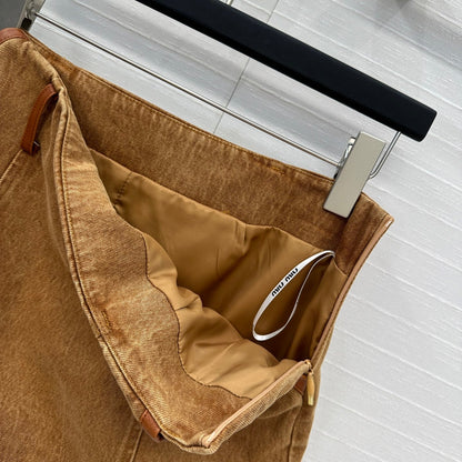 25 Egg white leather wrap around low waisted denim half skirt that