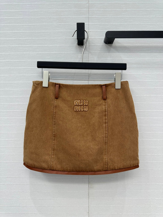 25 Egg white leather wrap around low waisted denim half skirt that