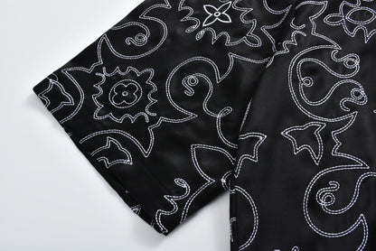 Arabesque boot thread embroidered short-sleeved shirt