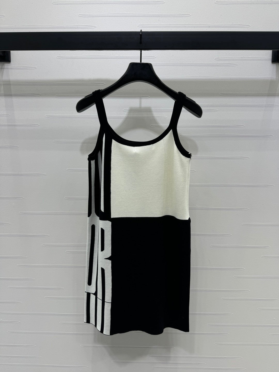 25 sling-back knit dress